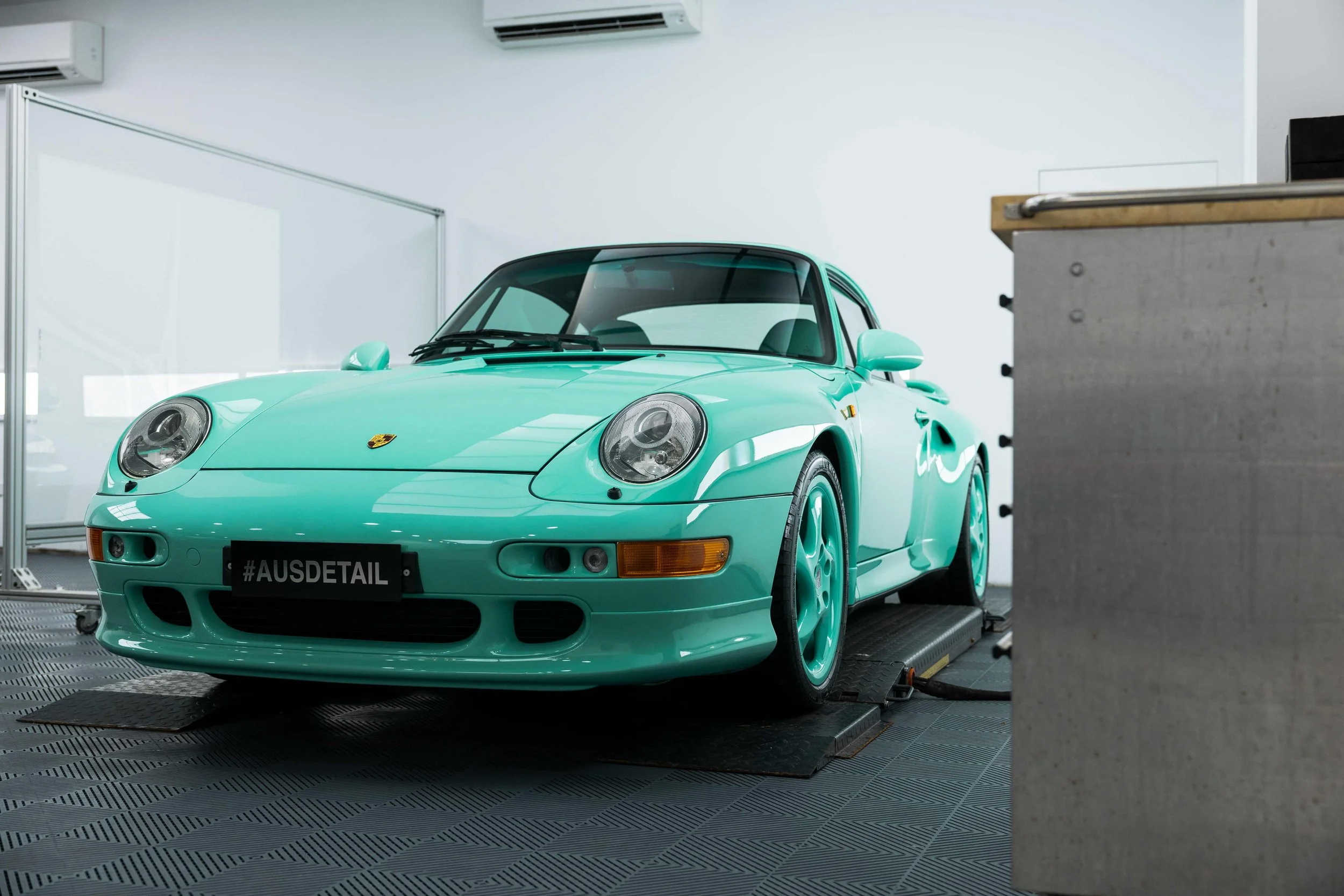 Mint green Porsche 993 front three quarter view with XPEL Paint Protection Film in Sydney