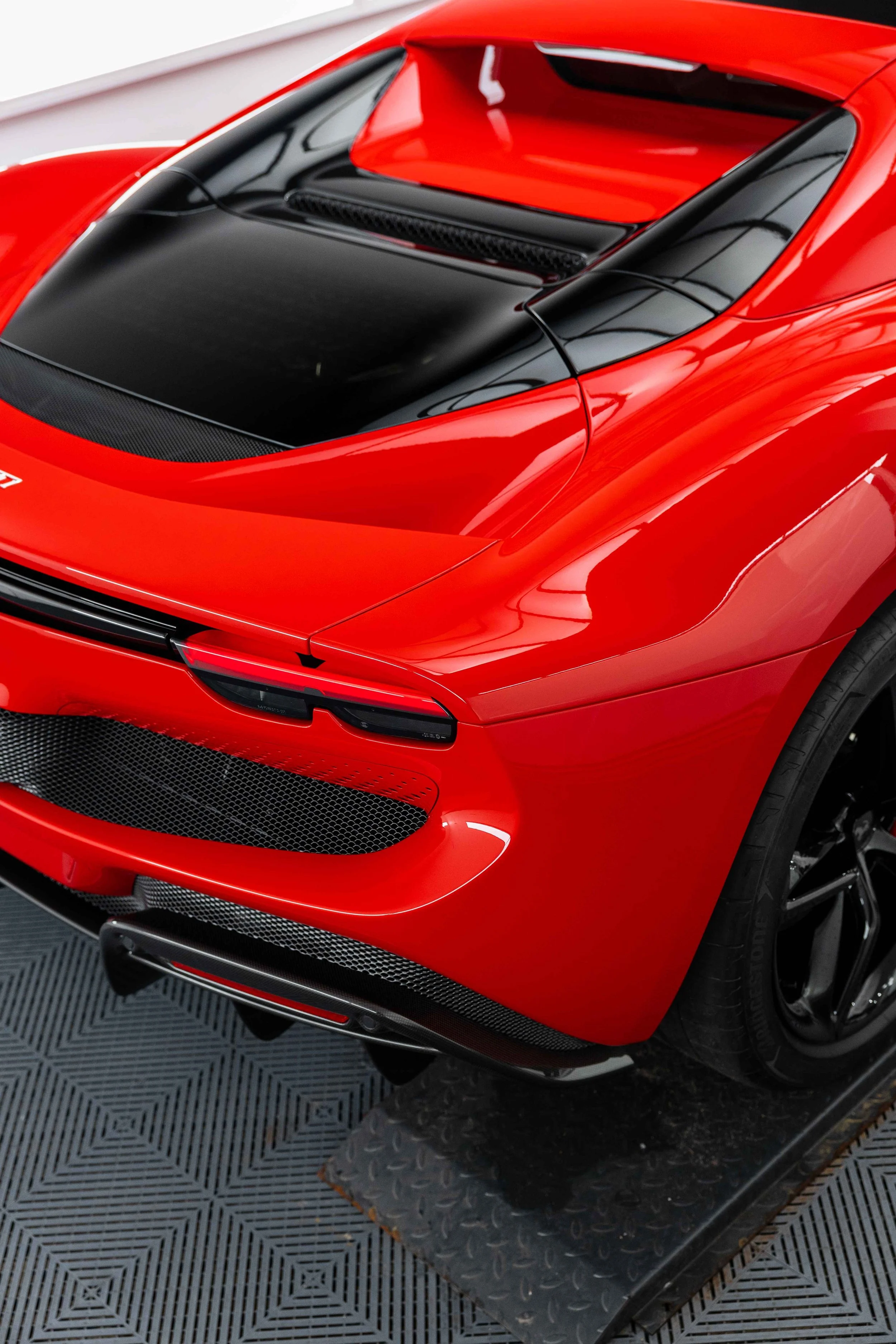 Red Ferrari 296 GTS rear spoiler and diffuser with XPEL Paint Protection Film in Sydney