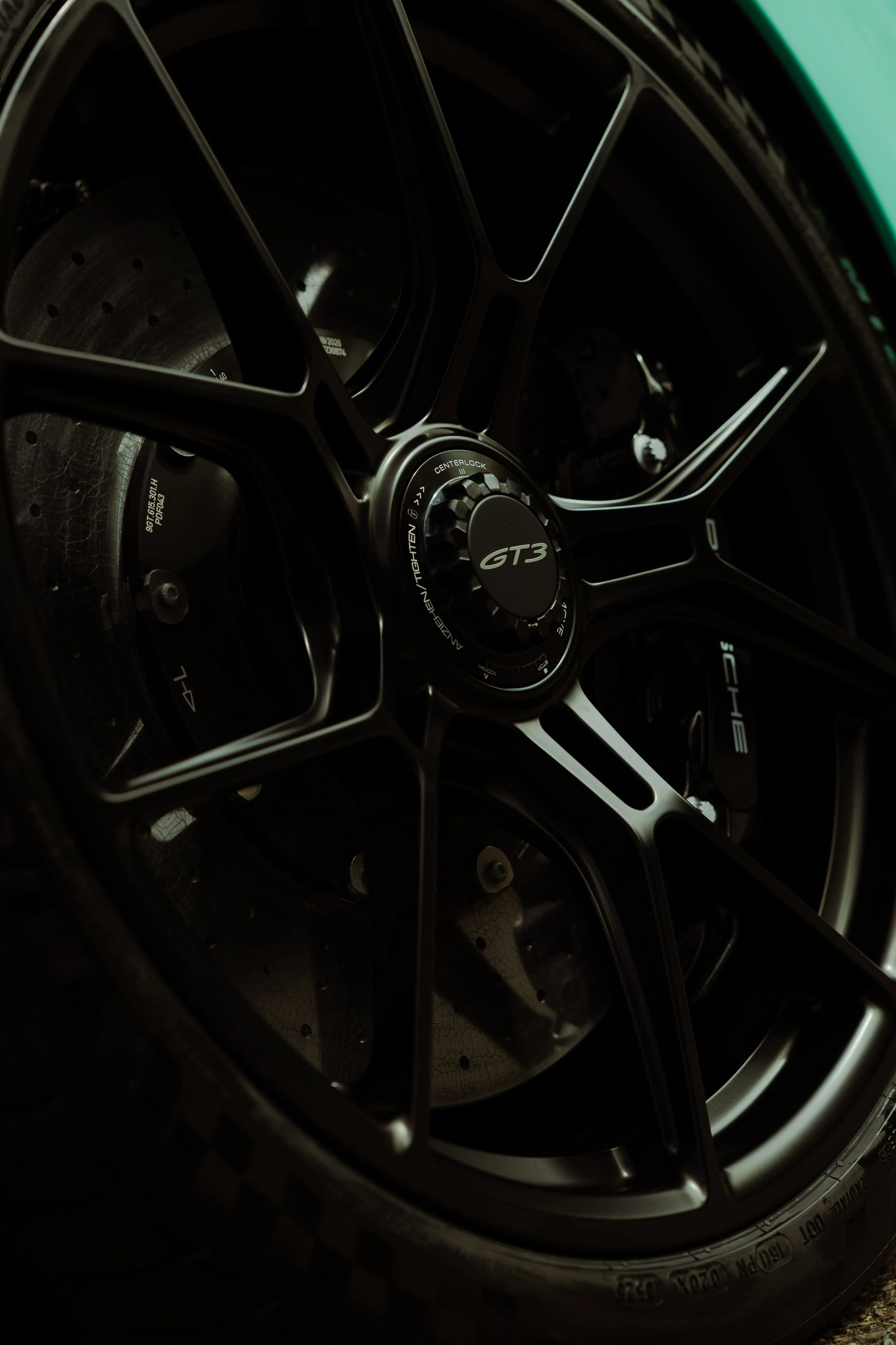 Mint green Porsche 911 GT3 black centre lock wheel and GT3 hub detail in Mona Vale