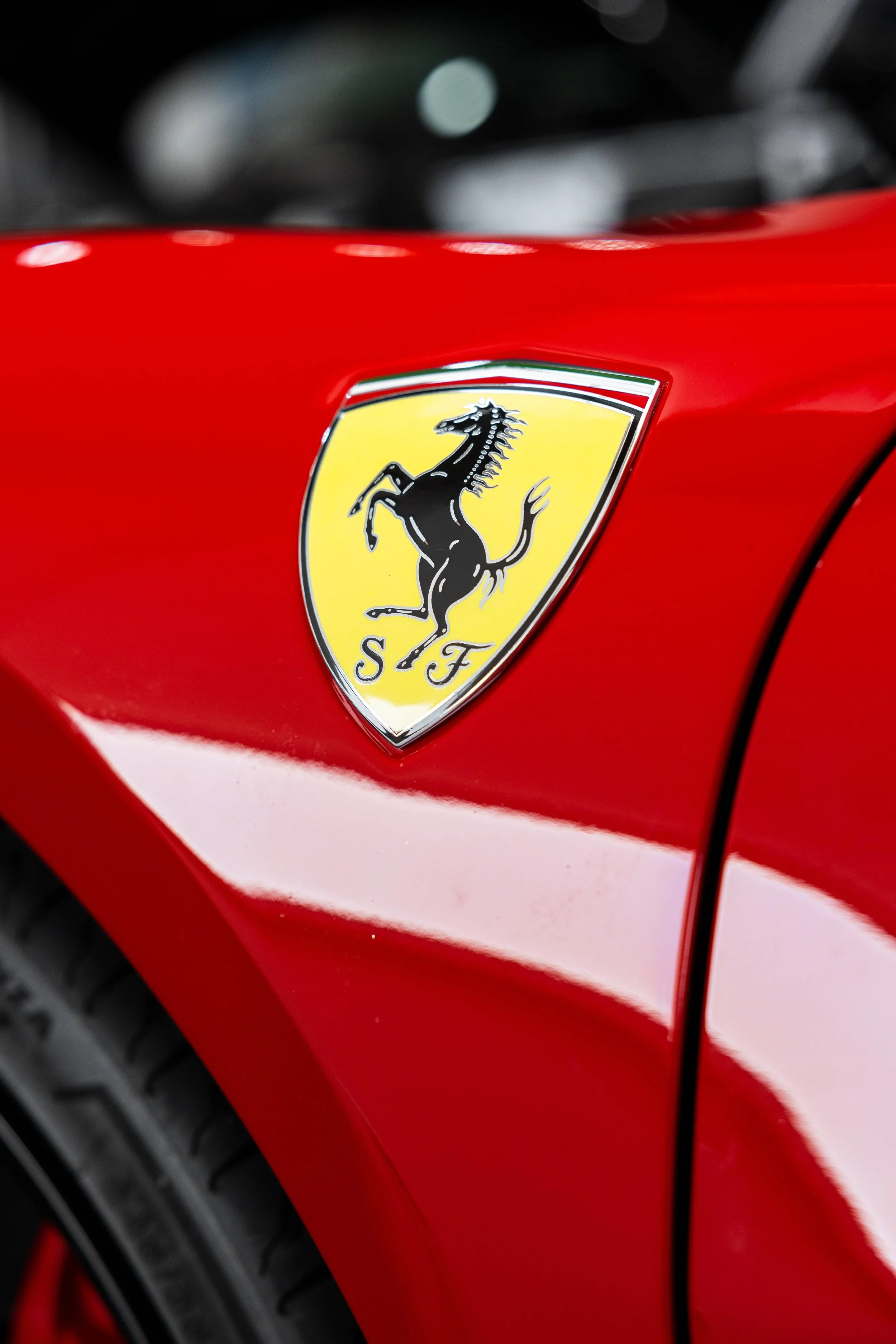 Red Ferrari 296 GTS Prancing Horse shield badge with XPEL Paint Protection Film in Sydney