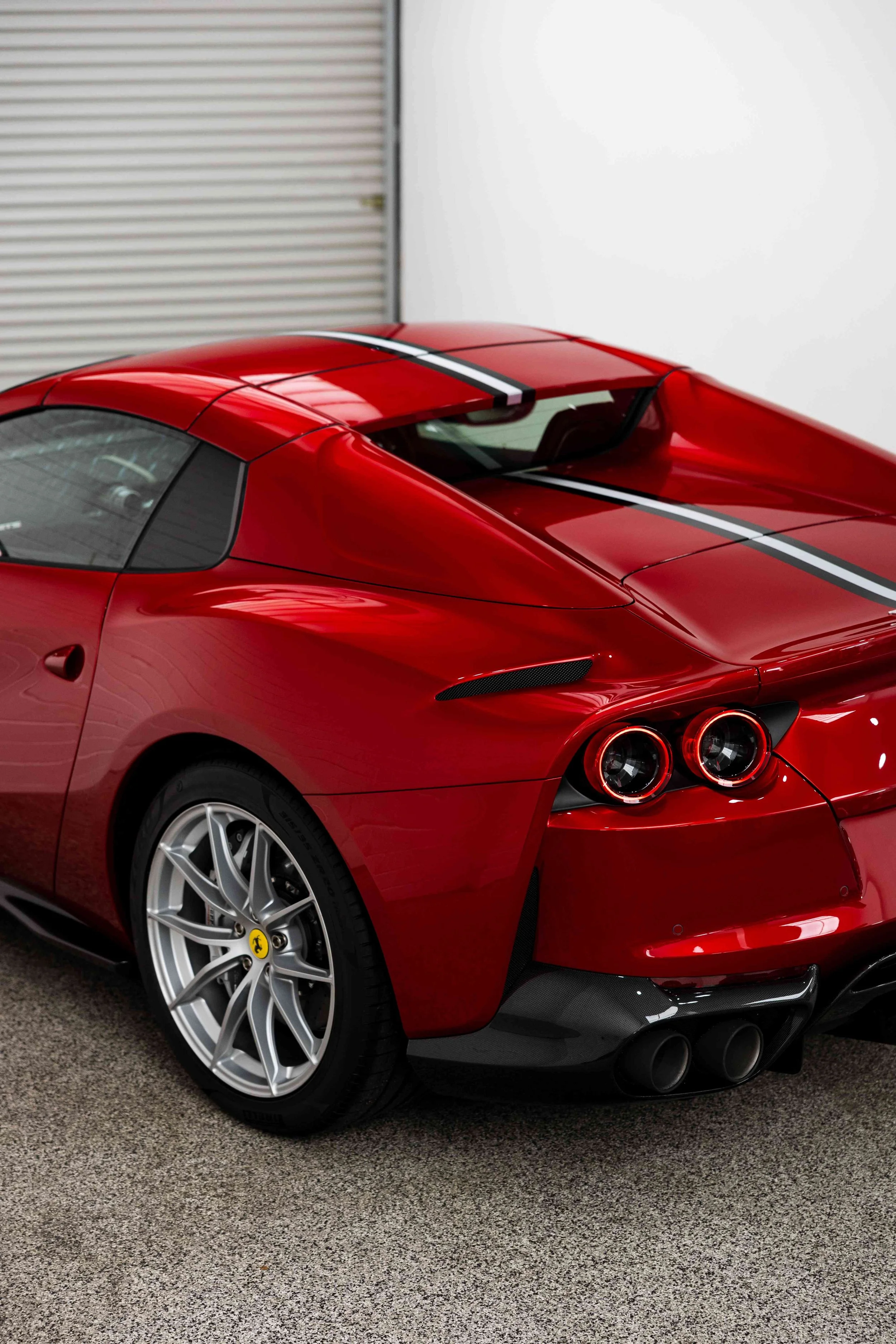 Red Ferrari 812 GTS rear quarter and wheel with XPEL Paint Protection Film in Mona Vale