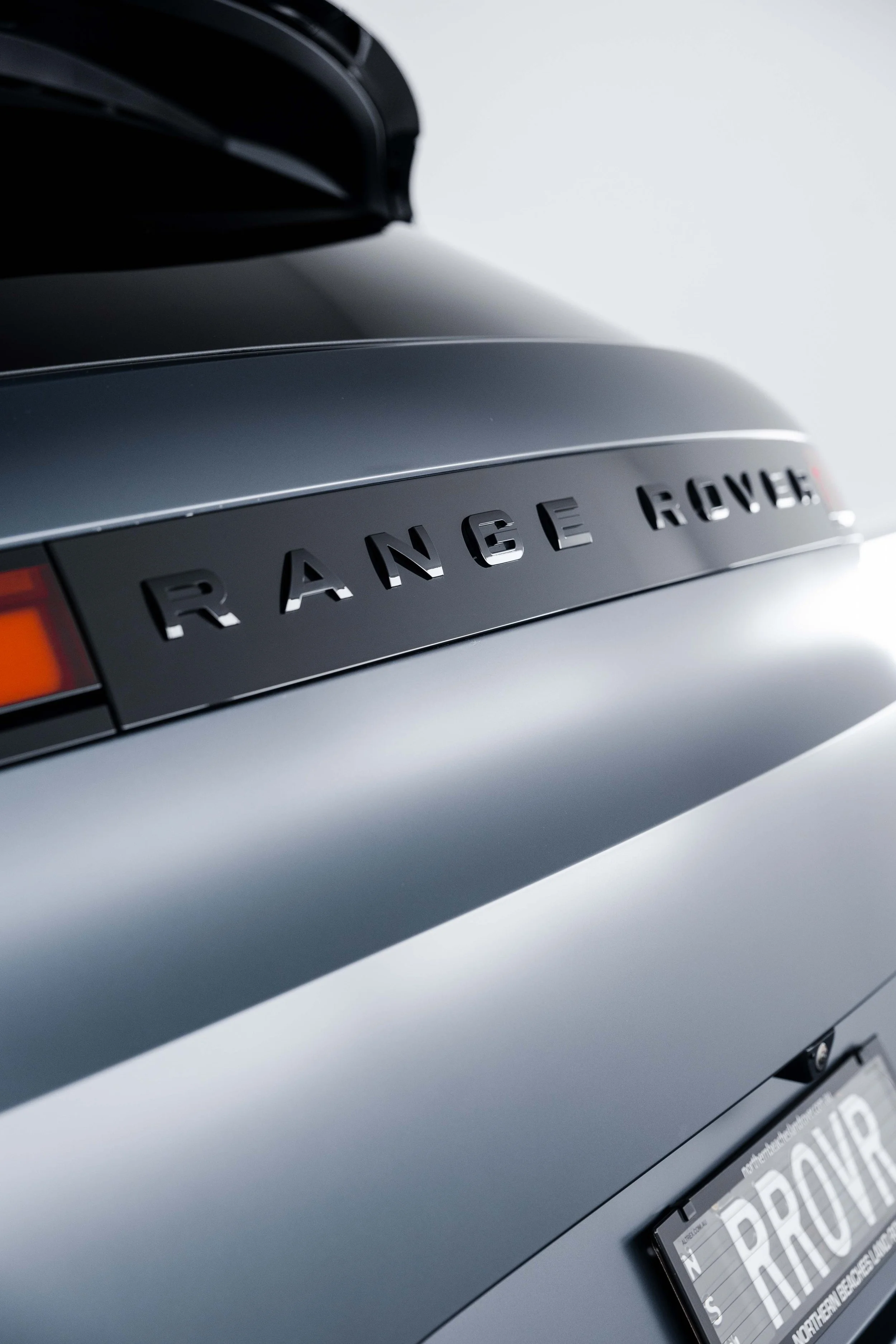 Range Rover badge on tailgate with XPEL Stealth Paint Protection Film in Sydney