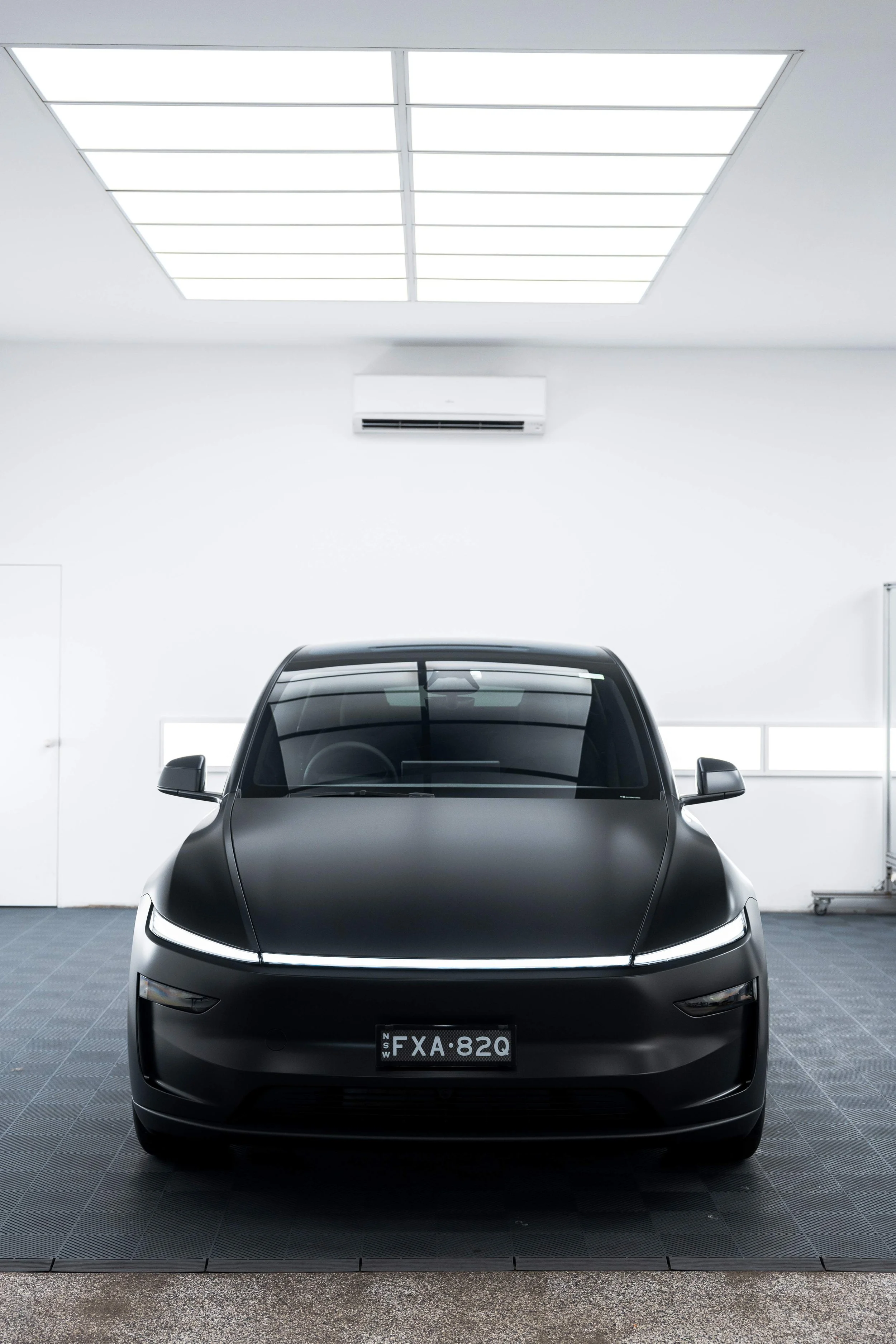 Matte black Tesla Model Y front end with XPEL Stealth Paint Protection Film in Mona Vale