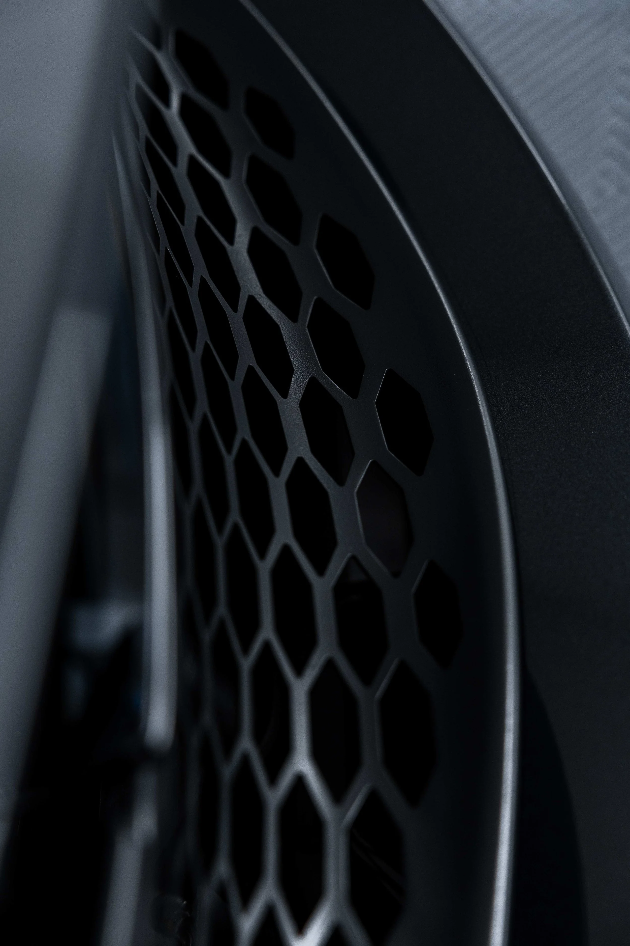 Black McLaren 750S front vent honeycomb detail with XPEL Paint Protection Film in Mona Vale