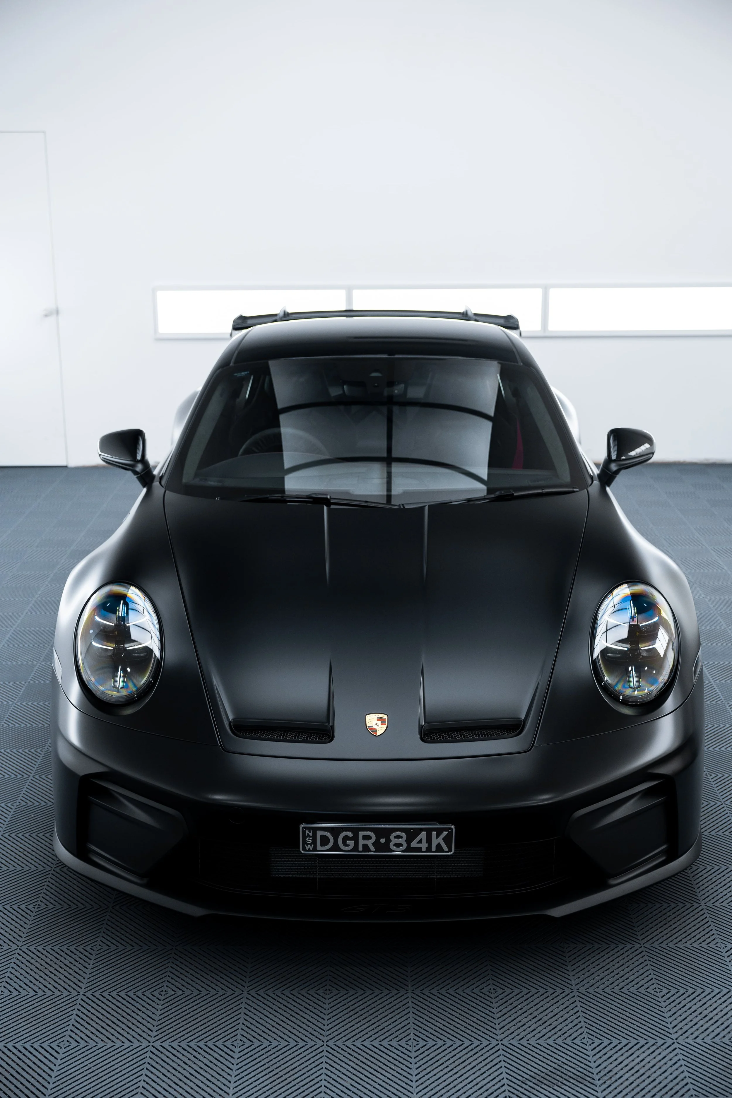 Black Porsche 911 GT3 with matte finish and full PPF by ADS in Mona Vale