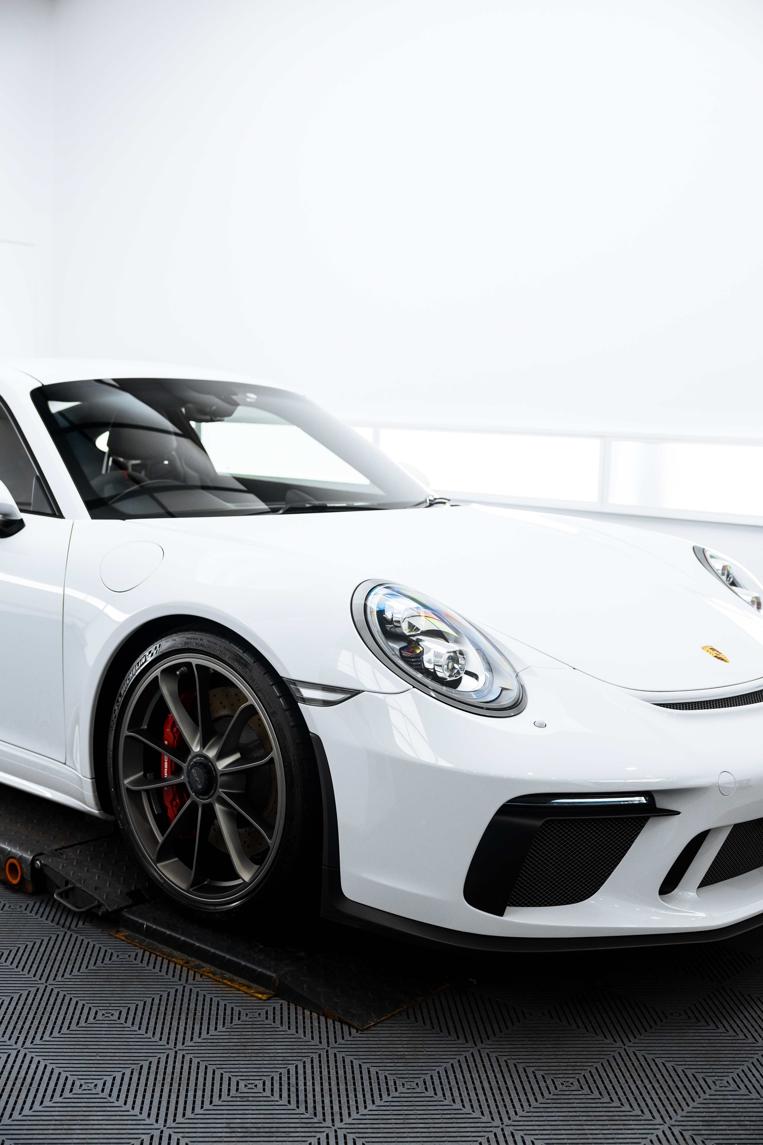 White Porsche GT3 front quarter and wheel with XPEL Paint Protection Film in Sydney