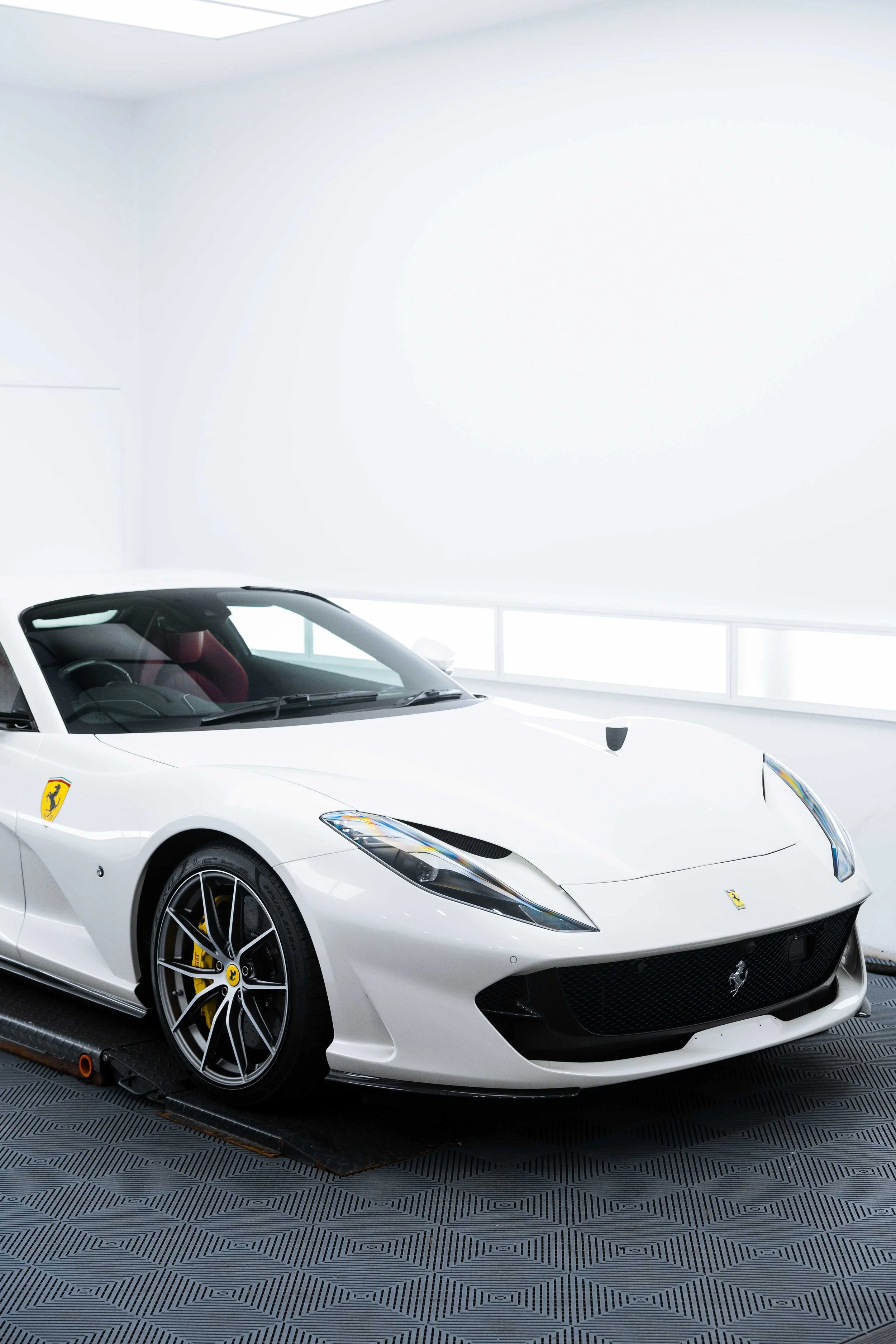 White Ferrari 812 GTS front three quarter with XPEL Paint Protection Film in Mona Vale