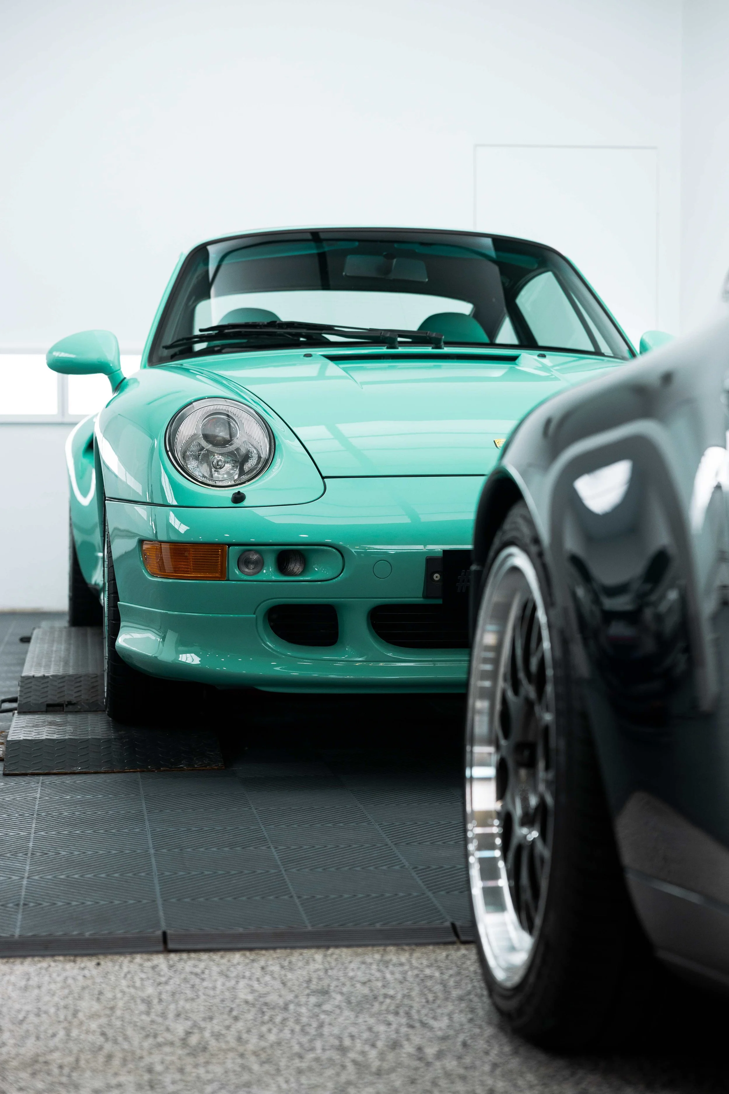 Mint green Porsche 993 front end with XPEL Paint Protection Film in Mona Vale