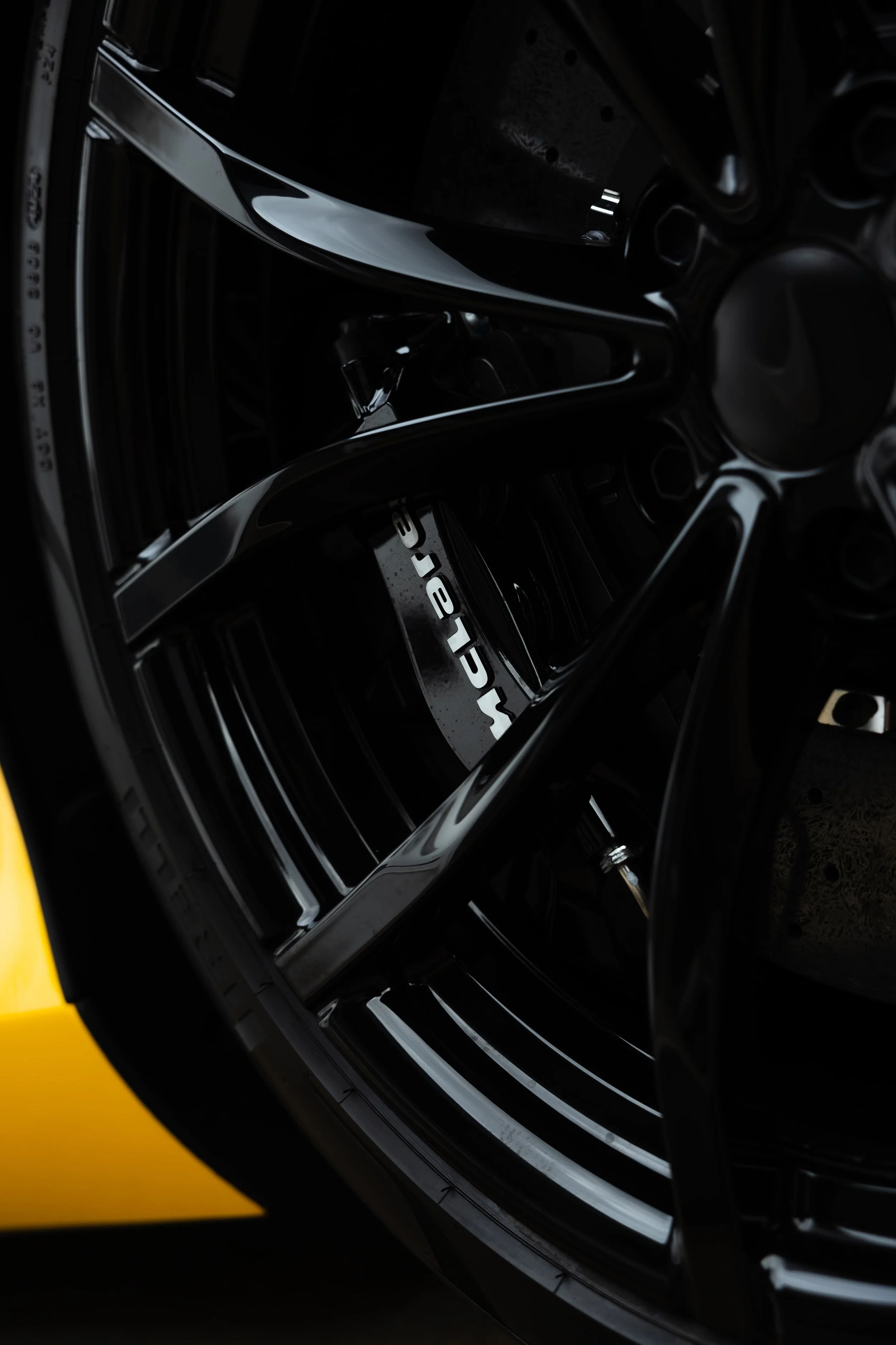 McLaren Artura black wheel and brake detail with PPF protection by ADS in Mona Vale
