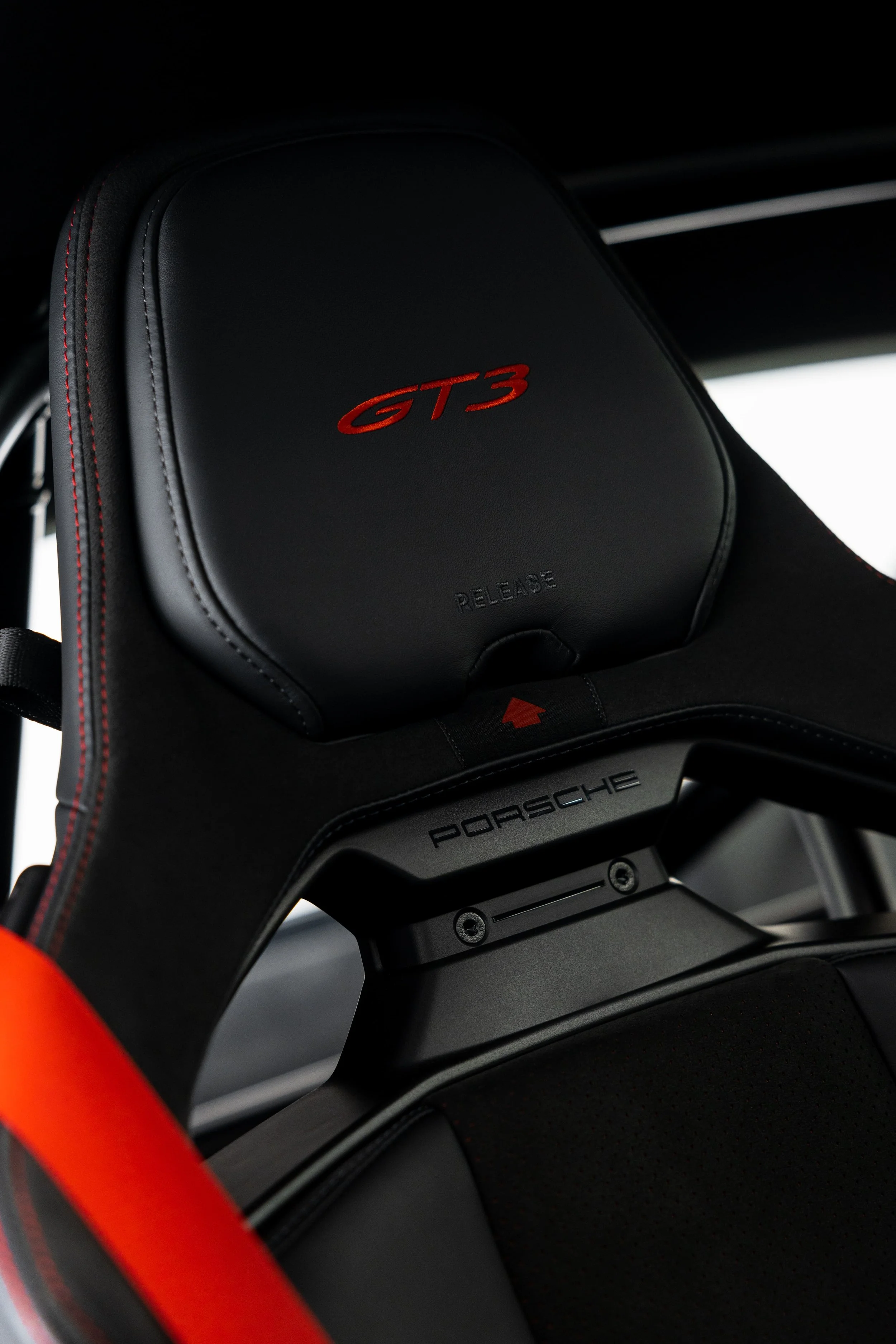 Interior detail of Porsche 911 GT3 bucket seat with red stitching and GT3 embossing by ADS in Mona Vale