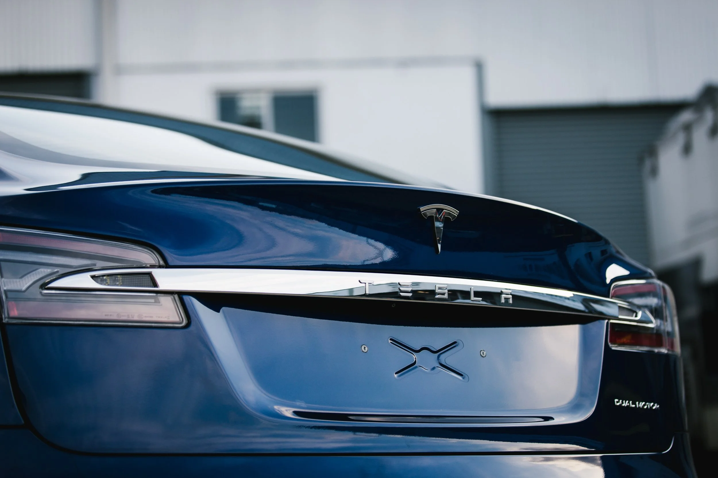 Tesla rear badge closeup XPEL paint protection film ADS Sydney