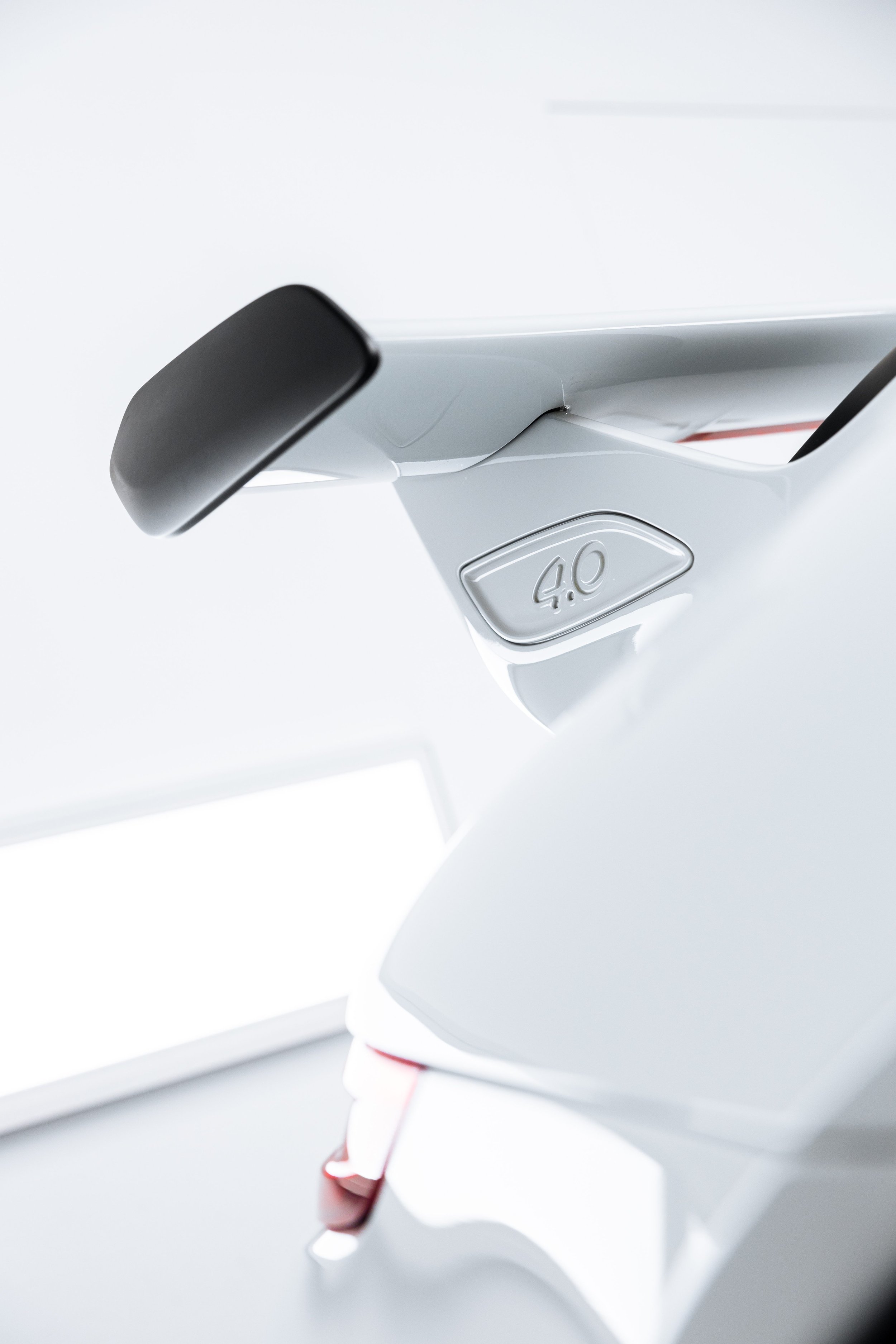 White Porsche GT3 rear wing 4.0 badge detail with XPEL Paint Protection Film in Mona Vale