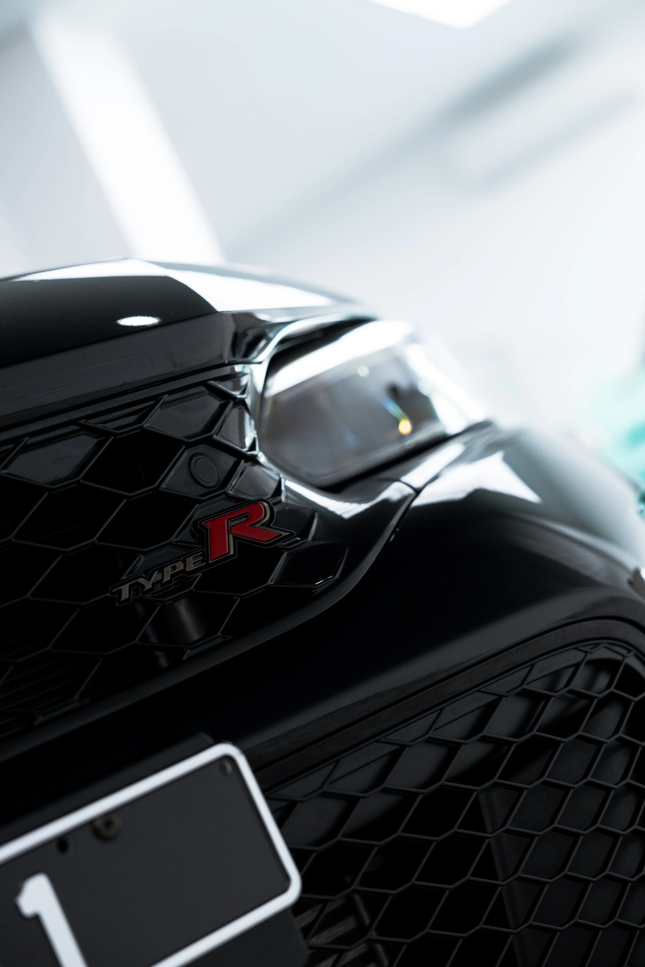 Black Honda Civic Type R grille and Type R badge with XPEL Paint Protection Film in Sydney