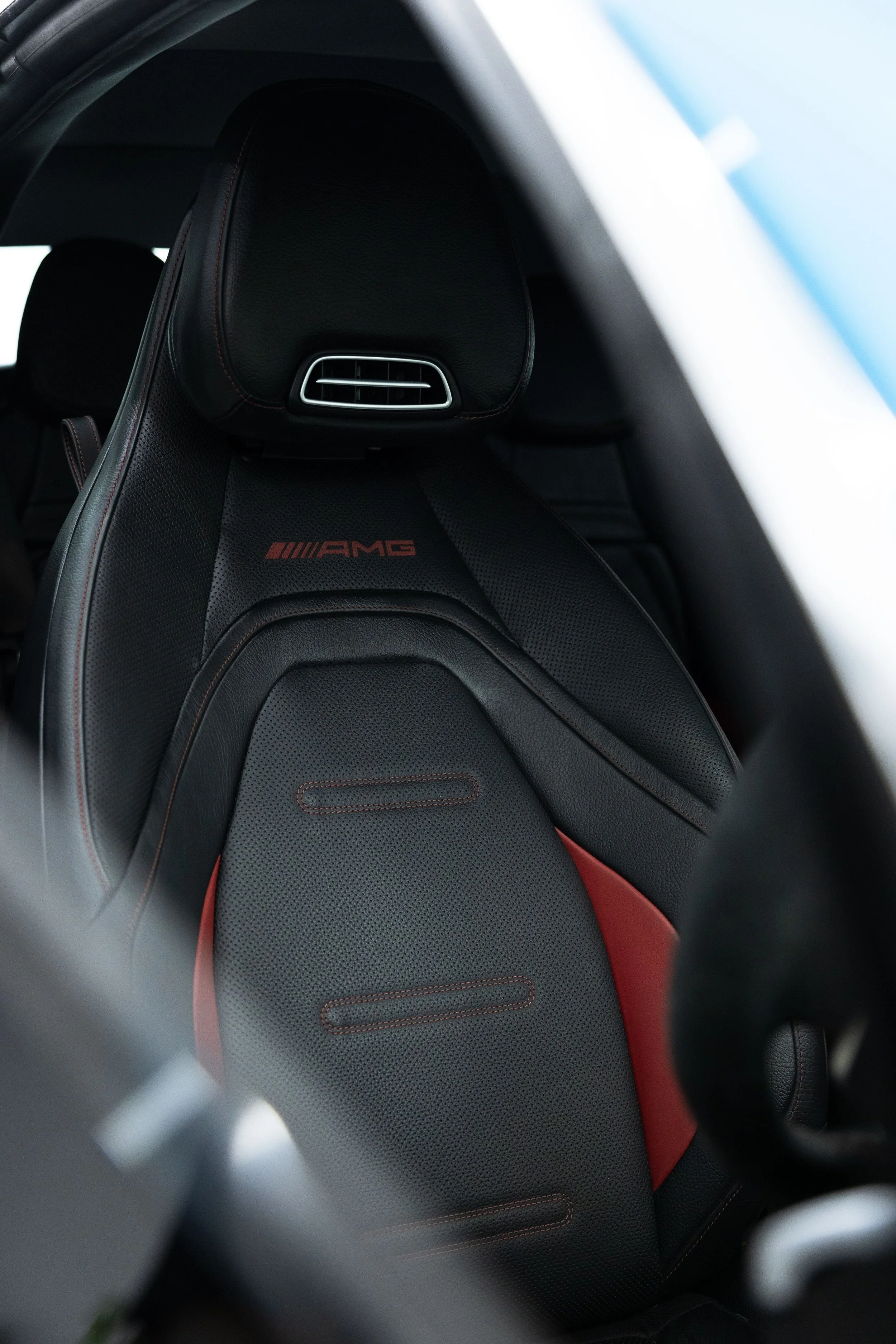 Mercedes-AMG performance seat interior with AMG badging in custom blue wrapped vehicle by ADS in Mona Vale