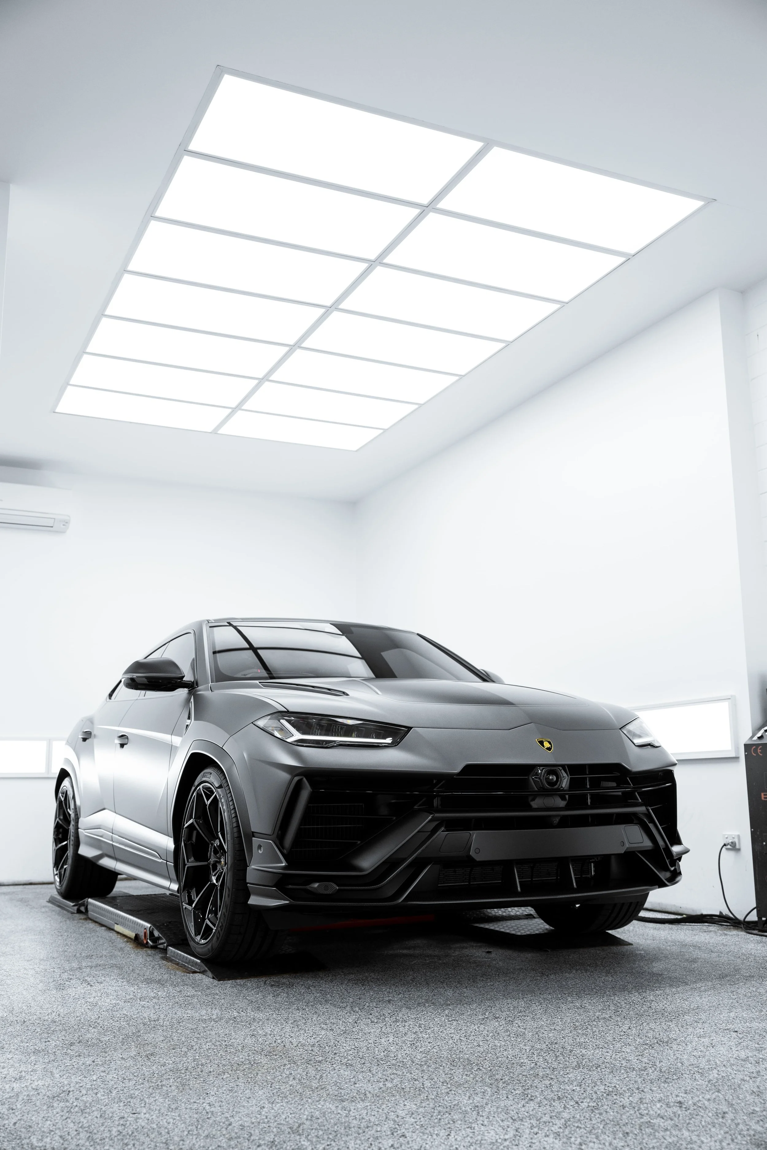 Full front view of Lamborghini Urus in matte grey with PPF protection by ADS in Sydney detailing studio