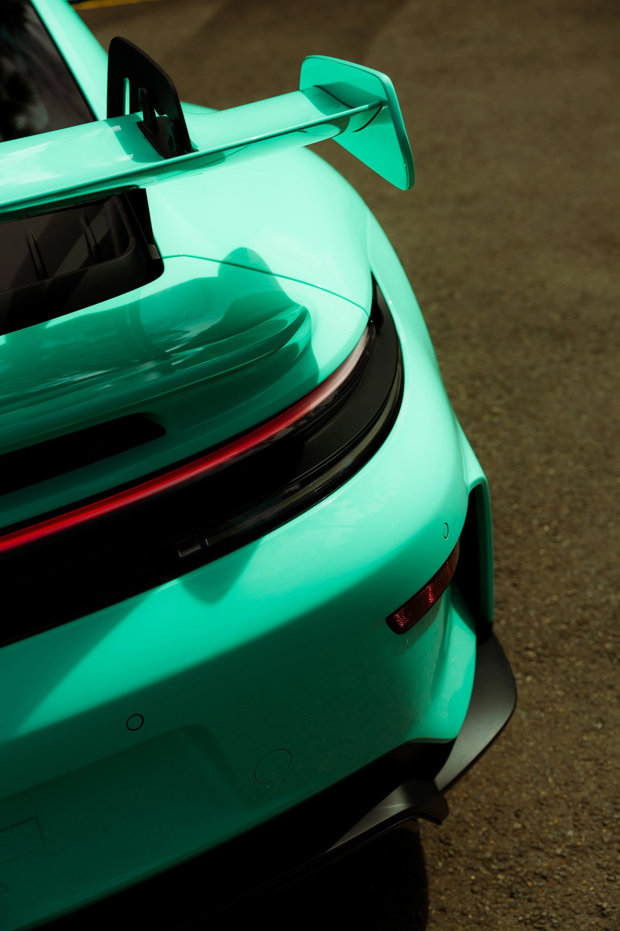 Mint green Porsche 911 GT3 rear quarter and taillight close up with XPEL Paint Protection Film in Mona Vale