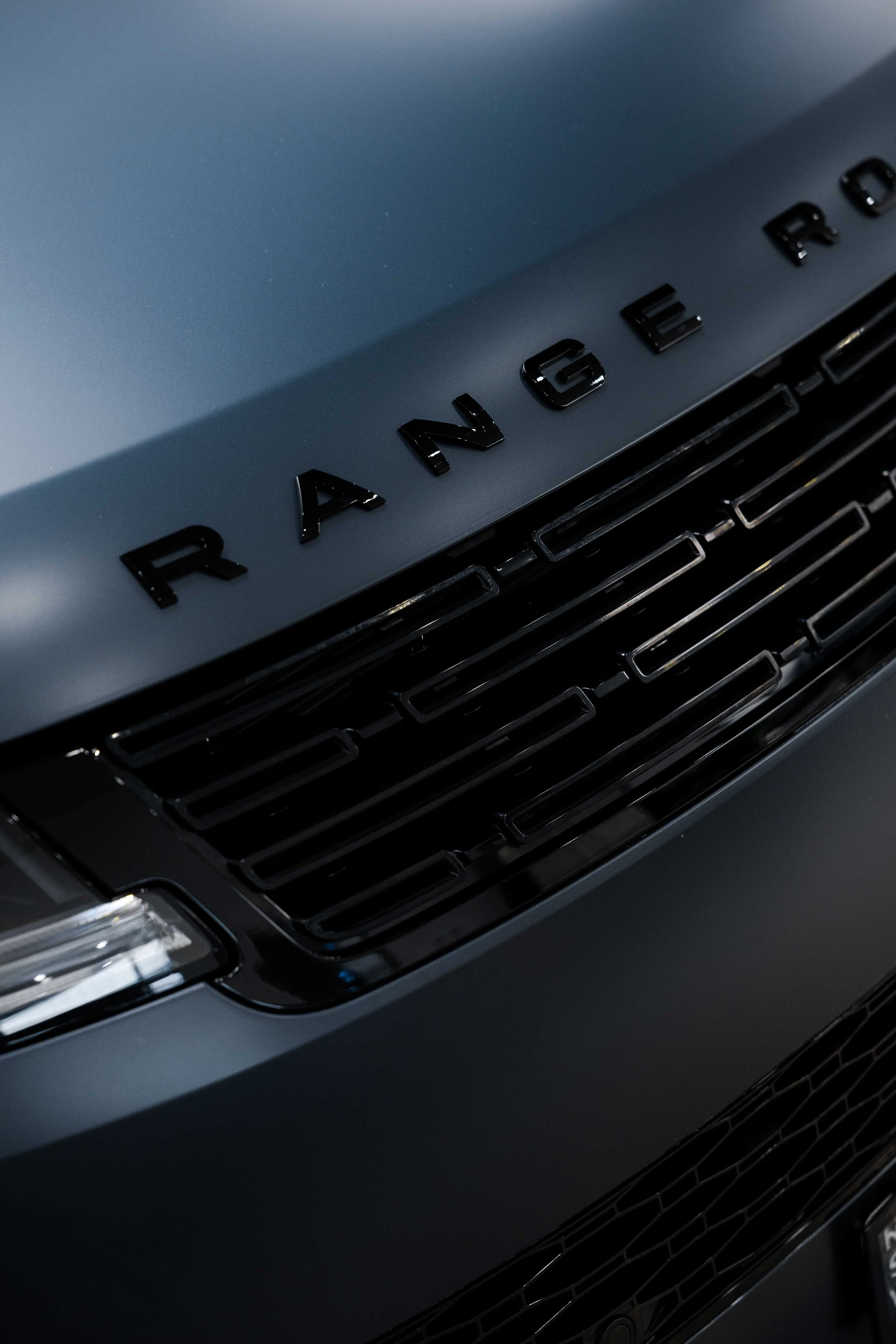 Range Rover Sport bonnet badge with XPEL Stealth Paint Protection Film in Sydney