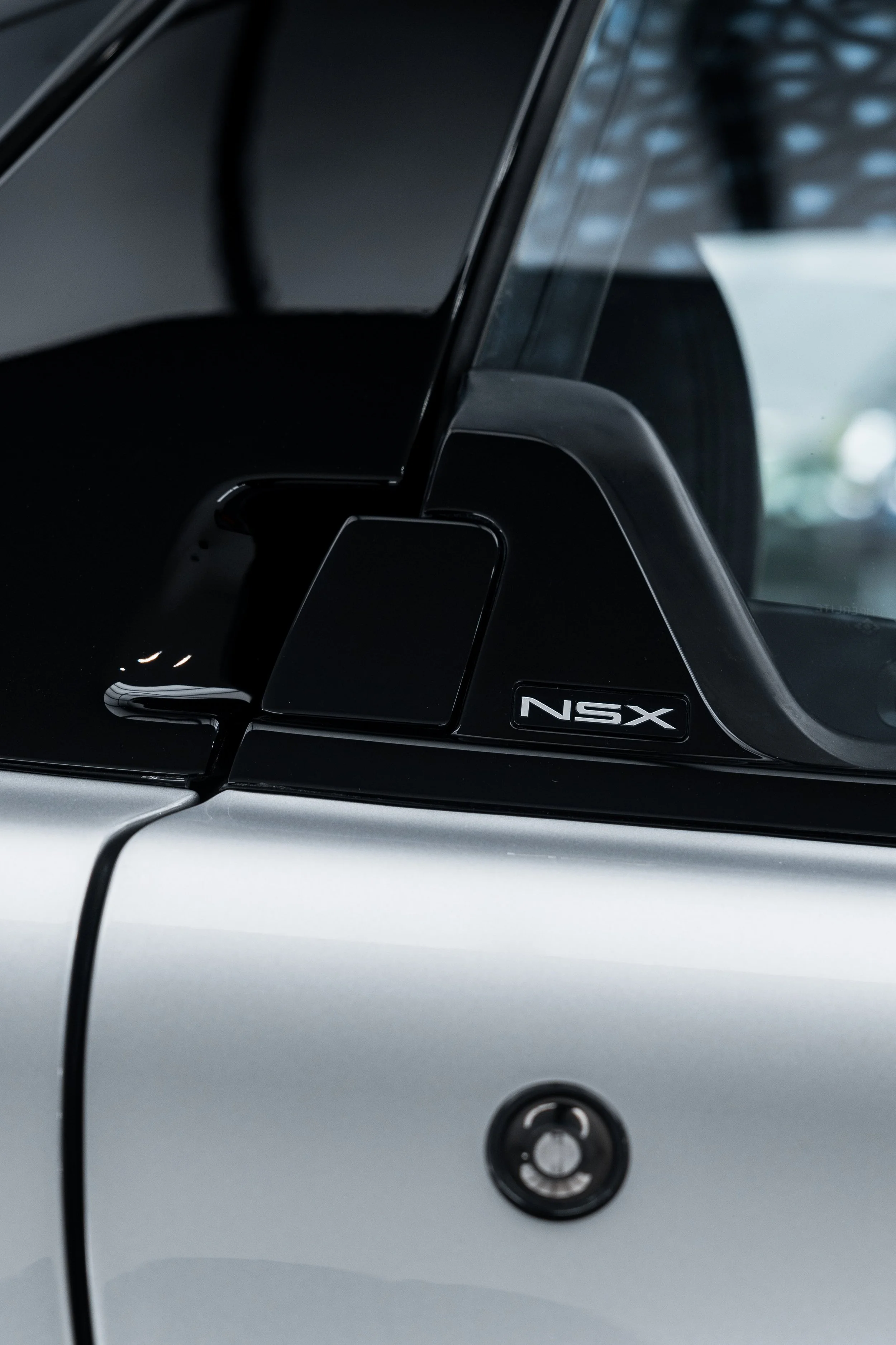 Honda NSX centre console badge after interior detailing in Mona Vale