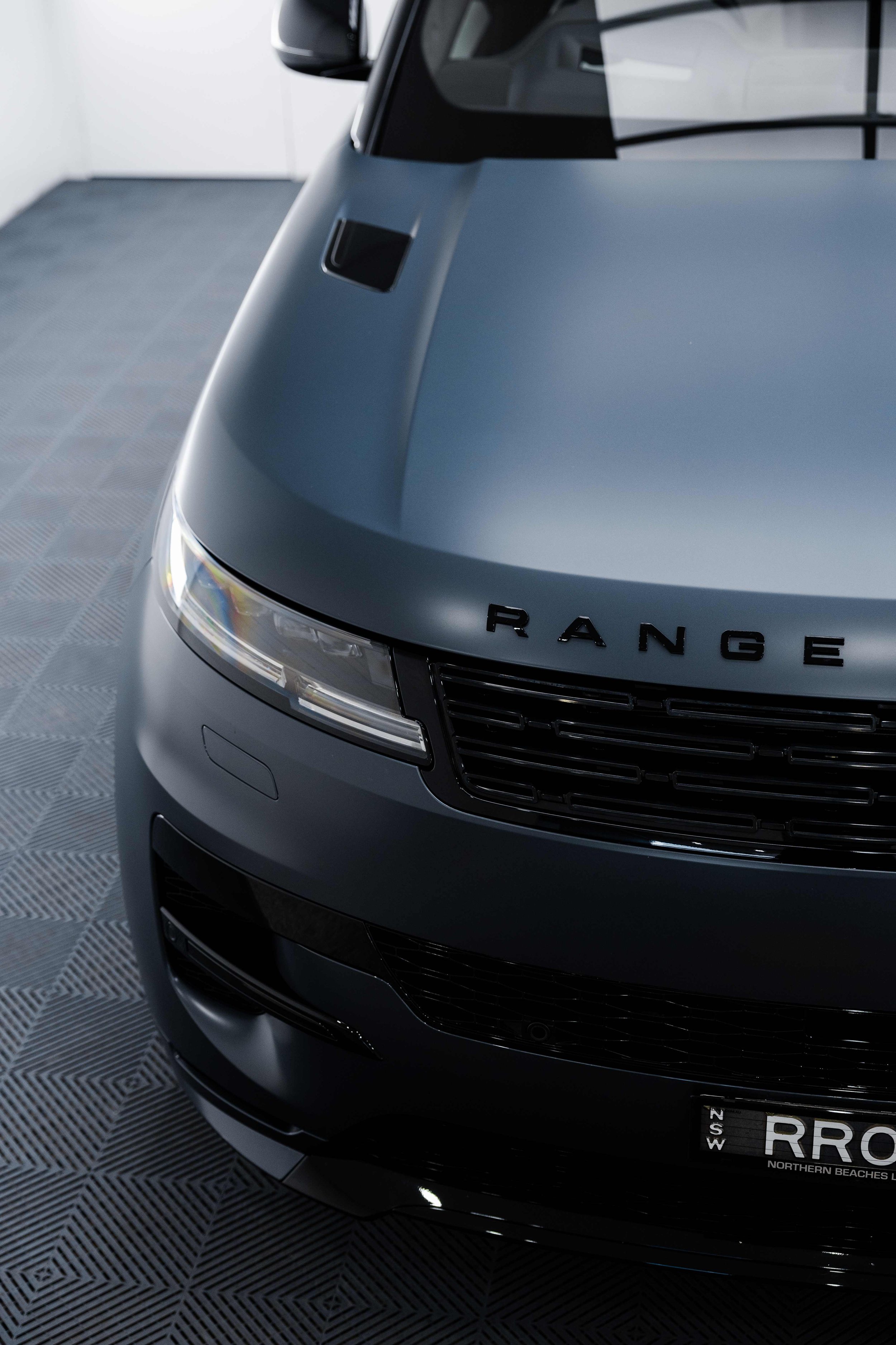 Matte grey Range Rover Sport front end with XPEL Stealth Paint Protection Film in Sydney