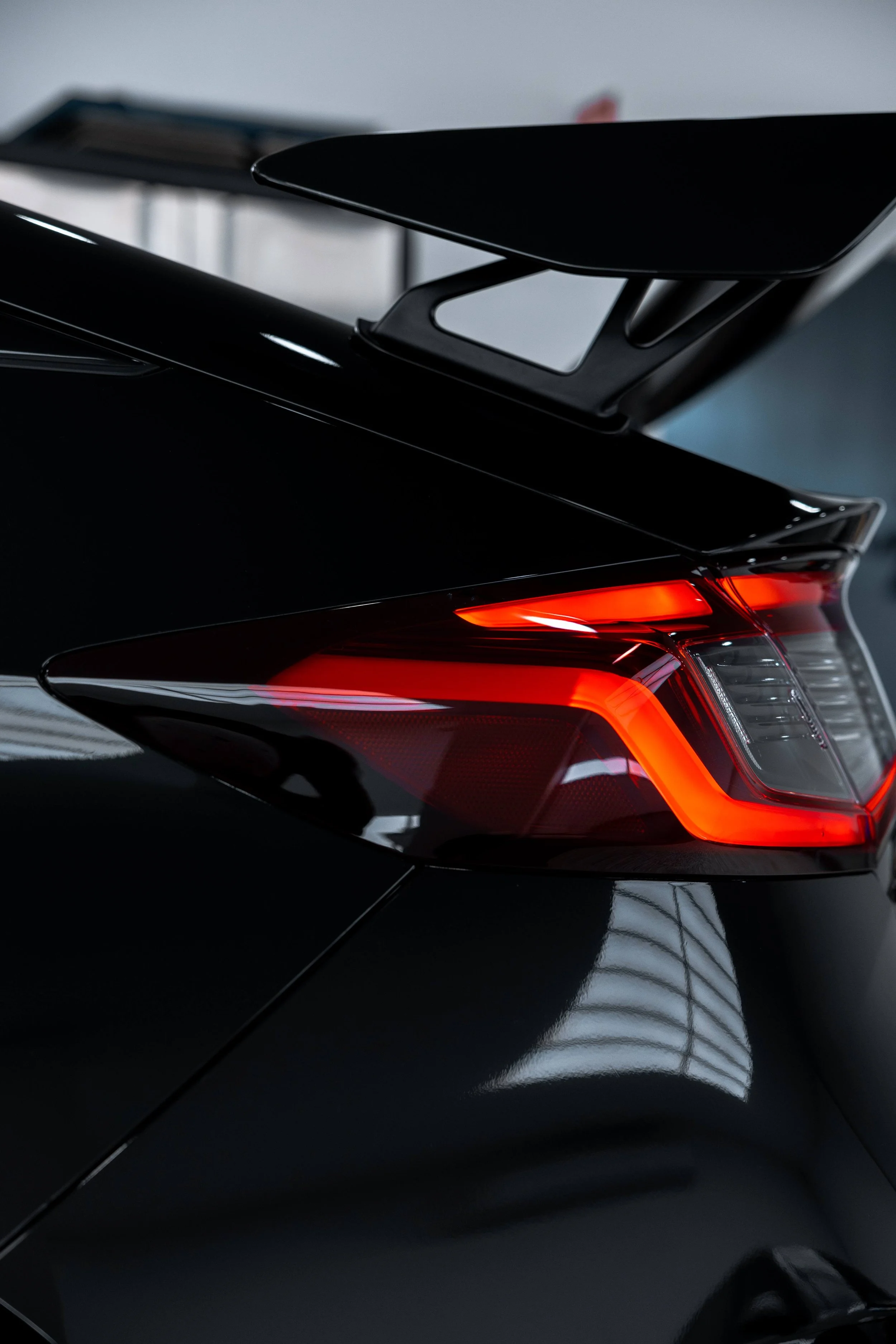 Black Honda Civic Type R tail light and rear wing with XPEL Paint Protection Film in Mona Vale