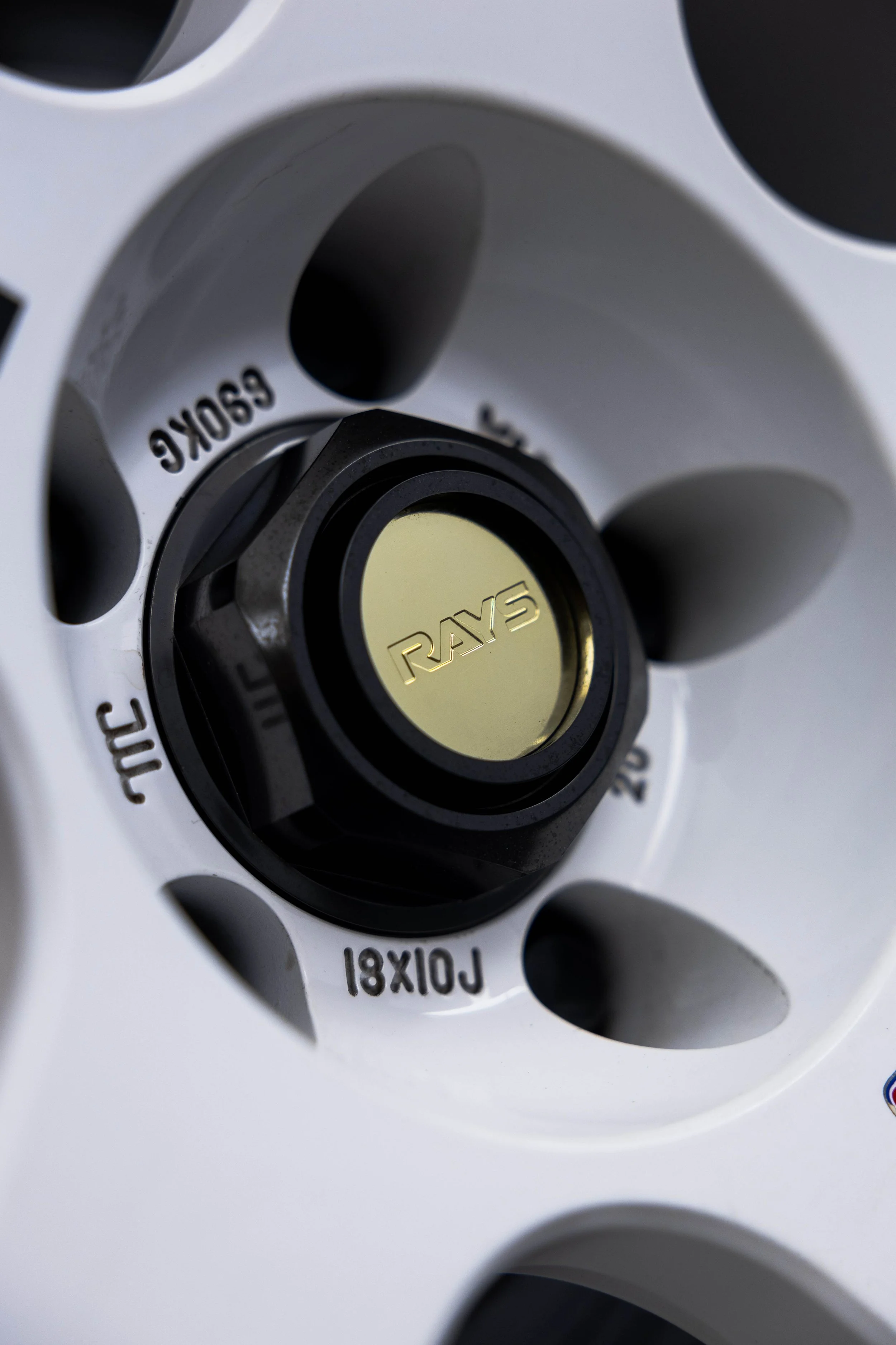 Rays wheel centre cap on Nissan R34 GT-R Nur after detailing in Mona Vale