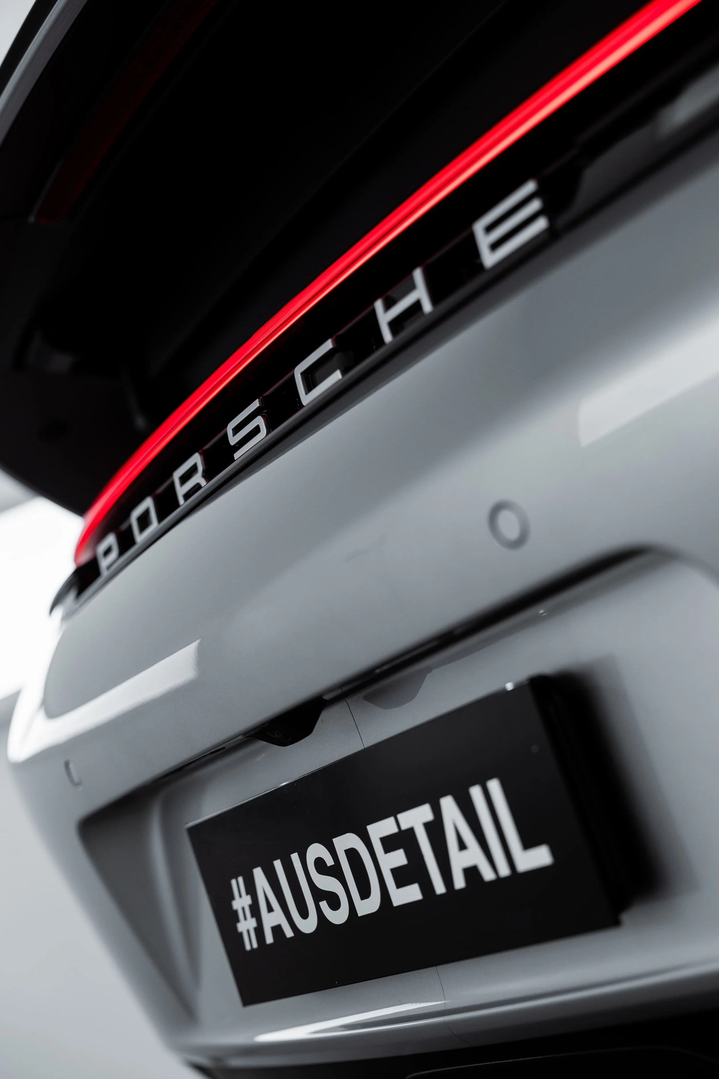 Porsche 911 GT3 Touring rear badge and LED light bar detail in white, protected by PPF by Australian Detailing Services Sydney