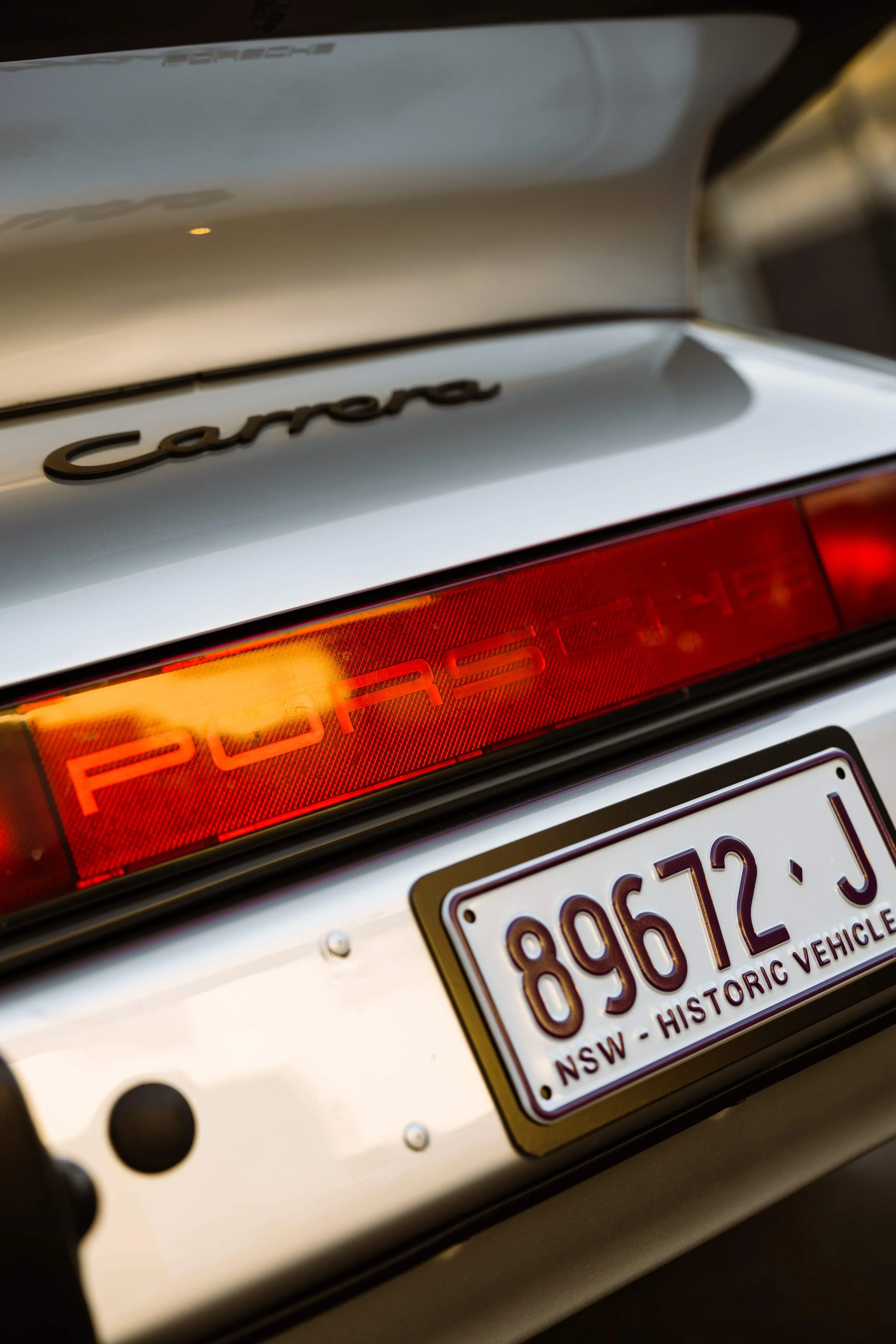 Silver 1989 Porsche 911 Carrera Targa Carrera badge and taillight in Sydney