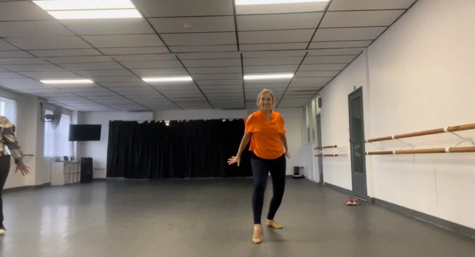 A Girl and an Orange Suit Had her first Dance Lesson in 30 years