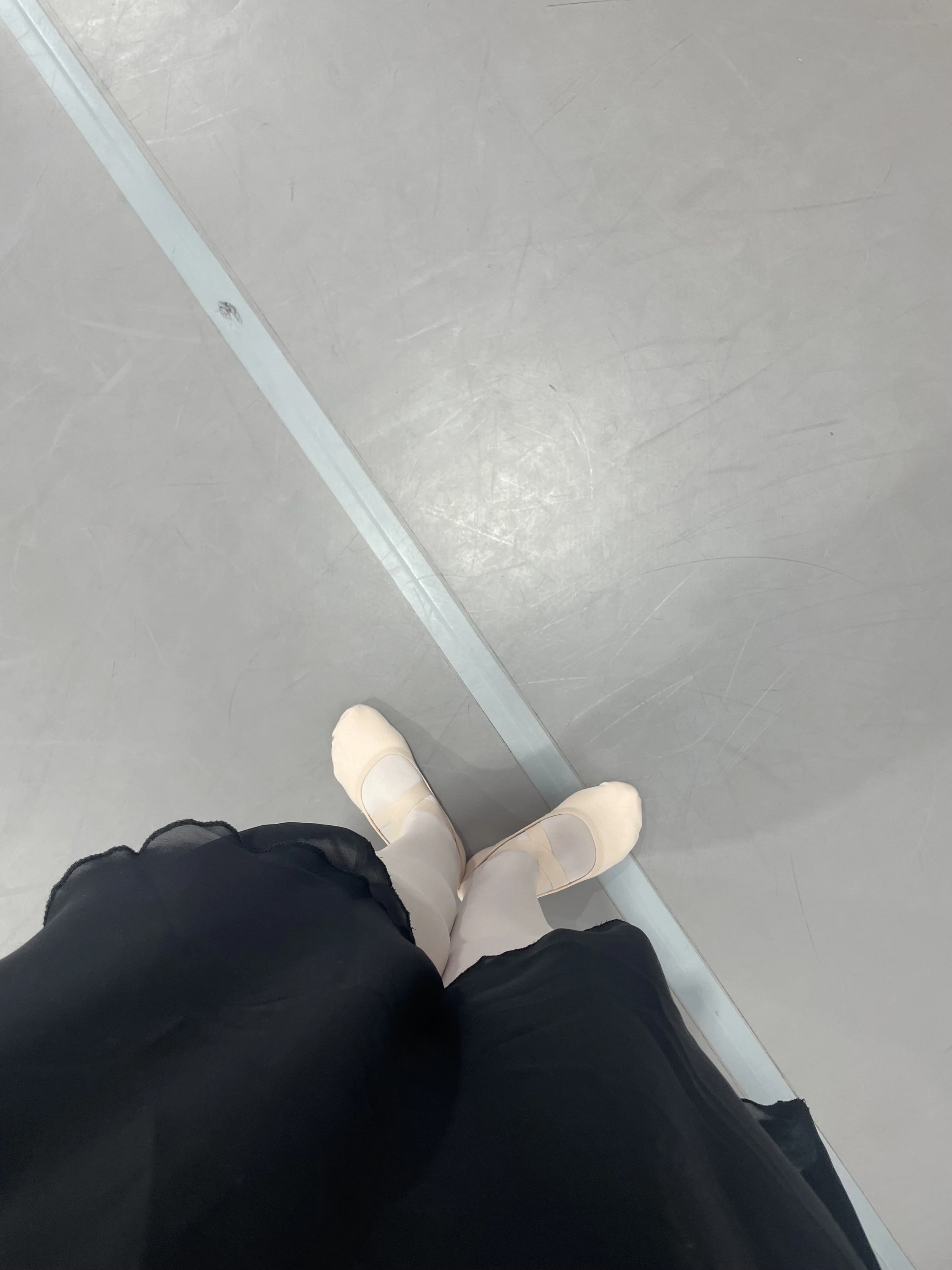 This girl in an orange suit went back to ballet classes