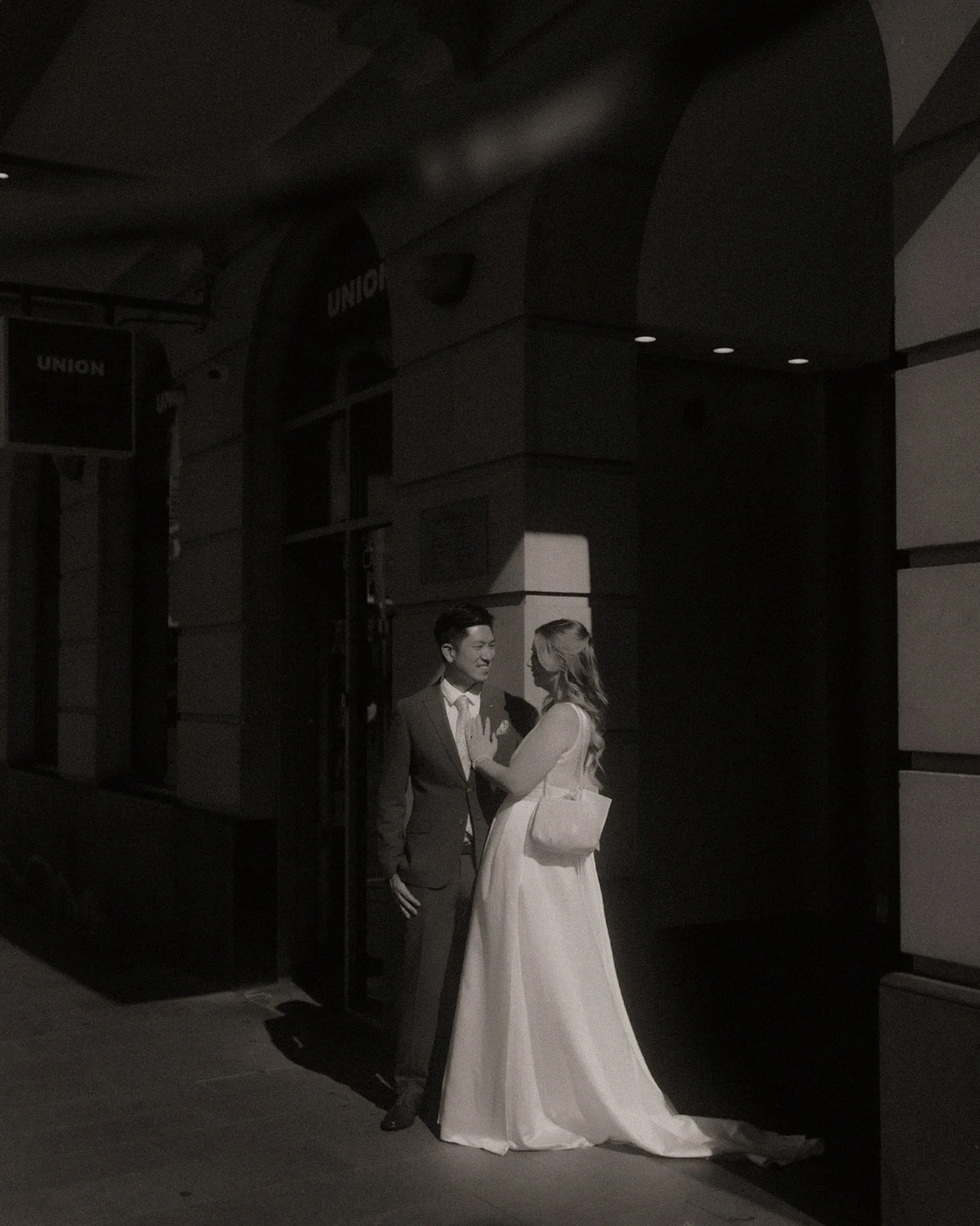 Amber &amp; David chose a weekday micro-wedding. Slow and unhurried, with a quiet &ldquo;yes&rdquo; at the Pyrmont wedding registry with only their nearest. The Sydney heat shimmering around us as we wandered through the city afterwards, finding pock
