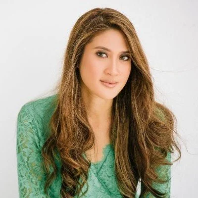 Headshot of Raja Jesrina, Founder & CEO at PurelyB