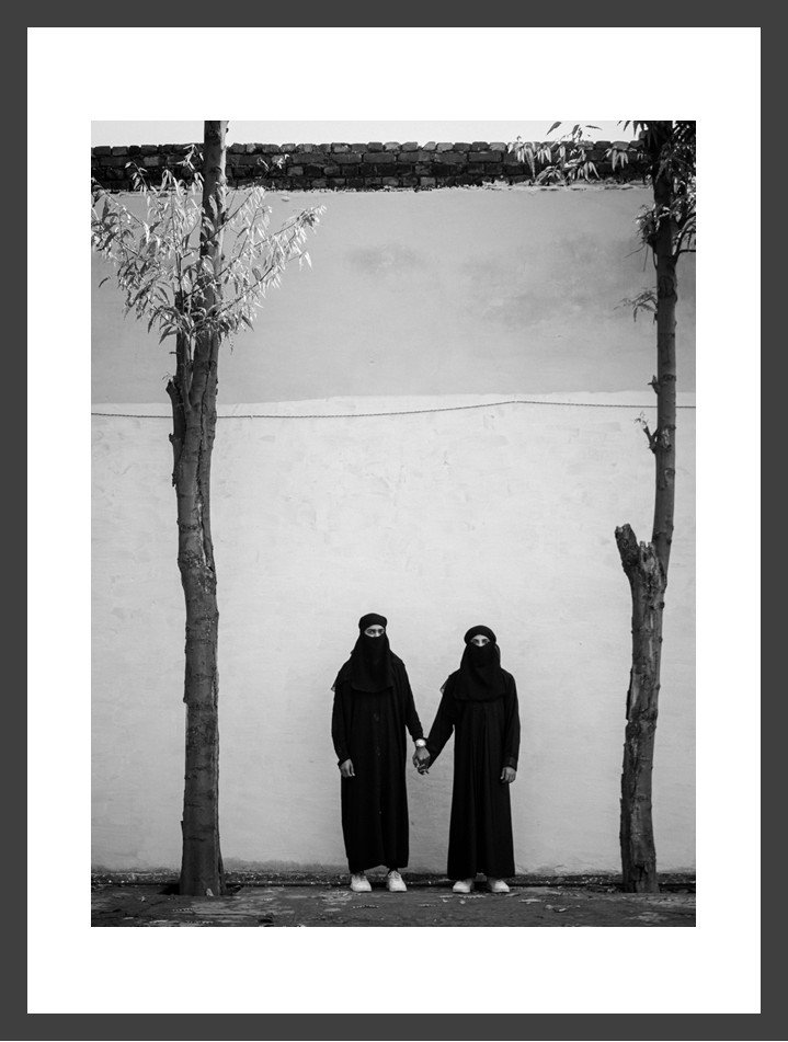 Time piece - 9 men in burqas.jpg