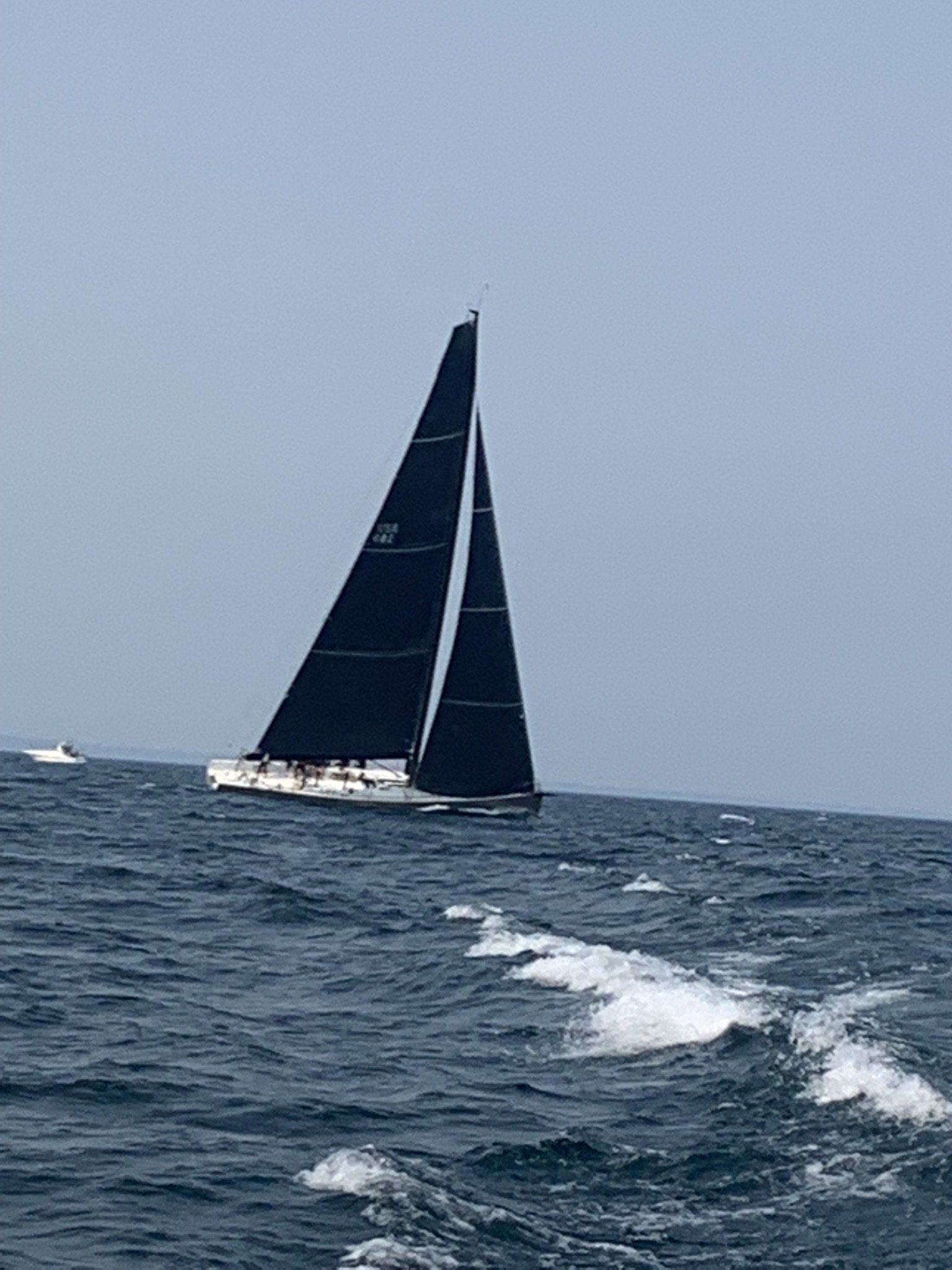 Sailboat racing towards Mackinac Island