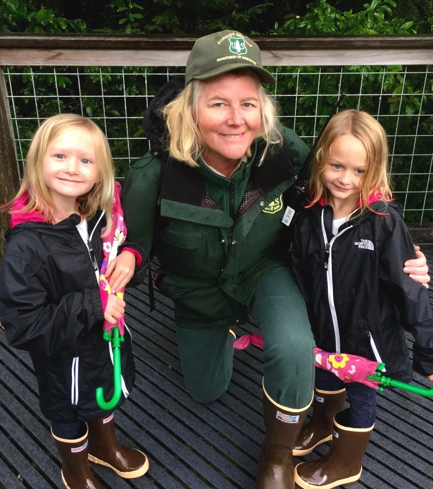 USFS Ranger Julie sharing a pic with young guests. 
