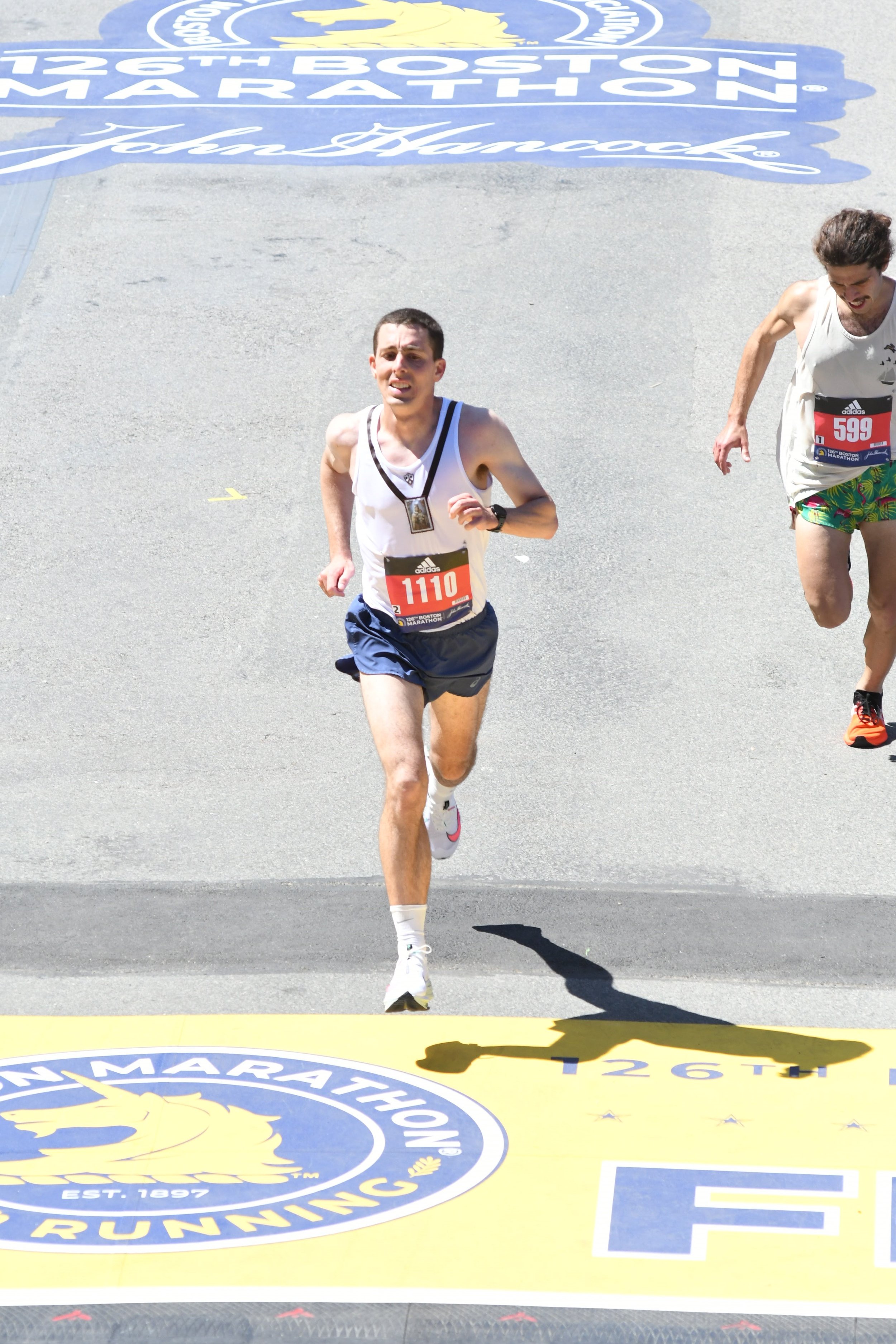 1138181_311486660_XLarge Br. crossing Finish line.jpg