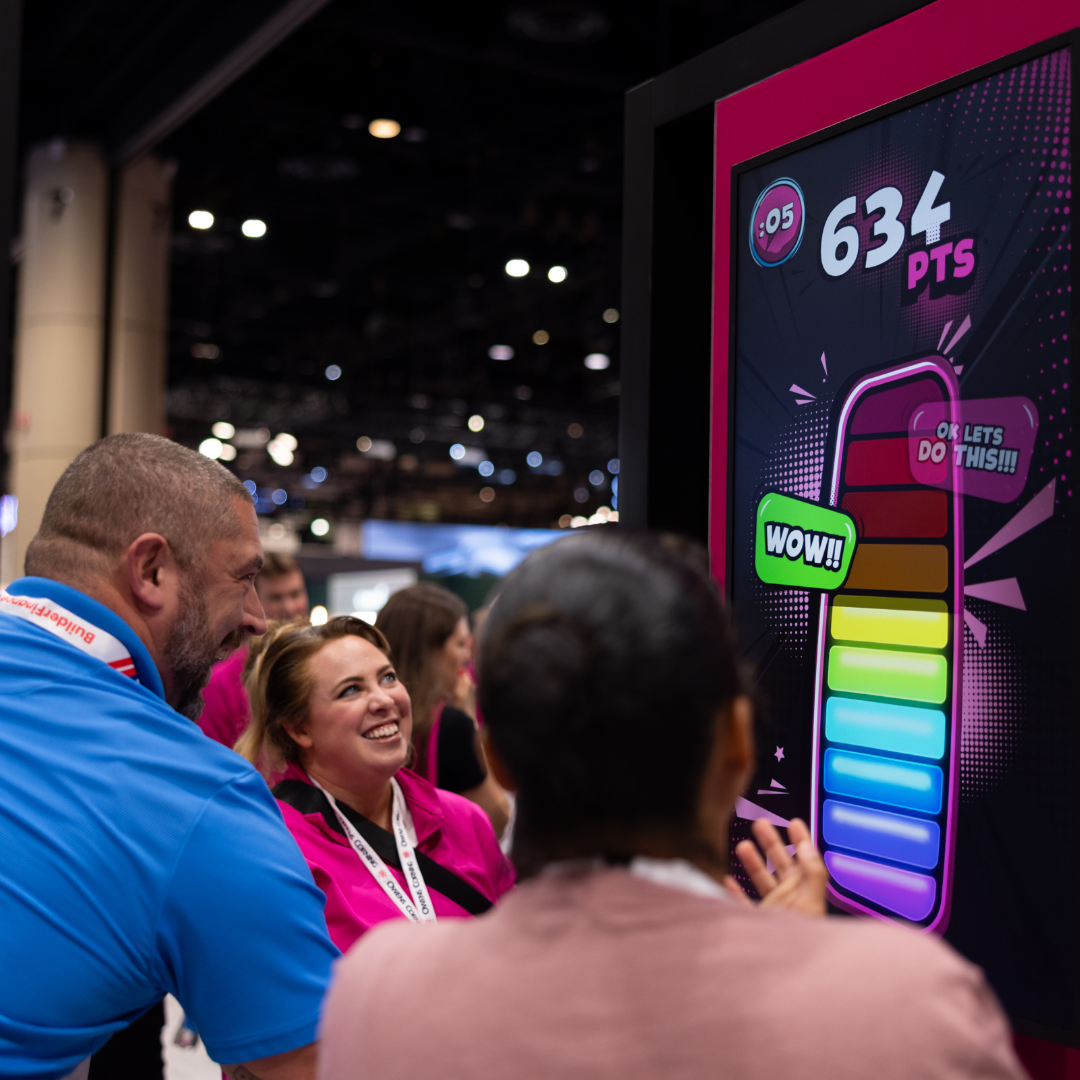 Attendees engaging with Owens Corning building solutions at IBS 2026