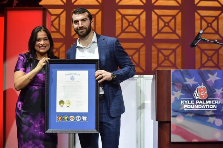 New Jersey Assemblywoman and Marine mother Annette Chaparro presented Palmieri with a joint legislative resolution from the New Jersey Senate and Assembly. (Photo Credits: Sean Conklin)