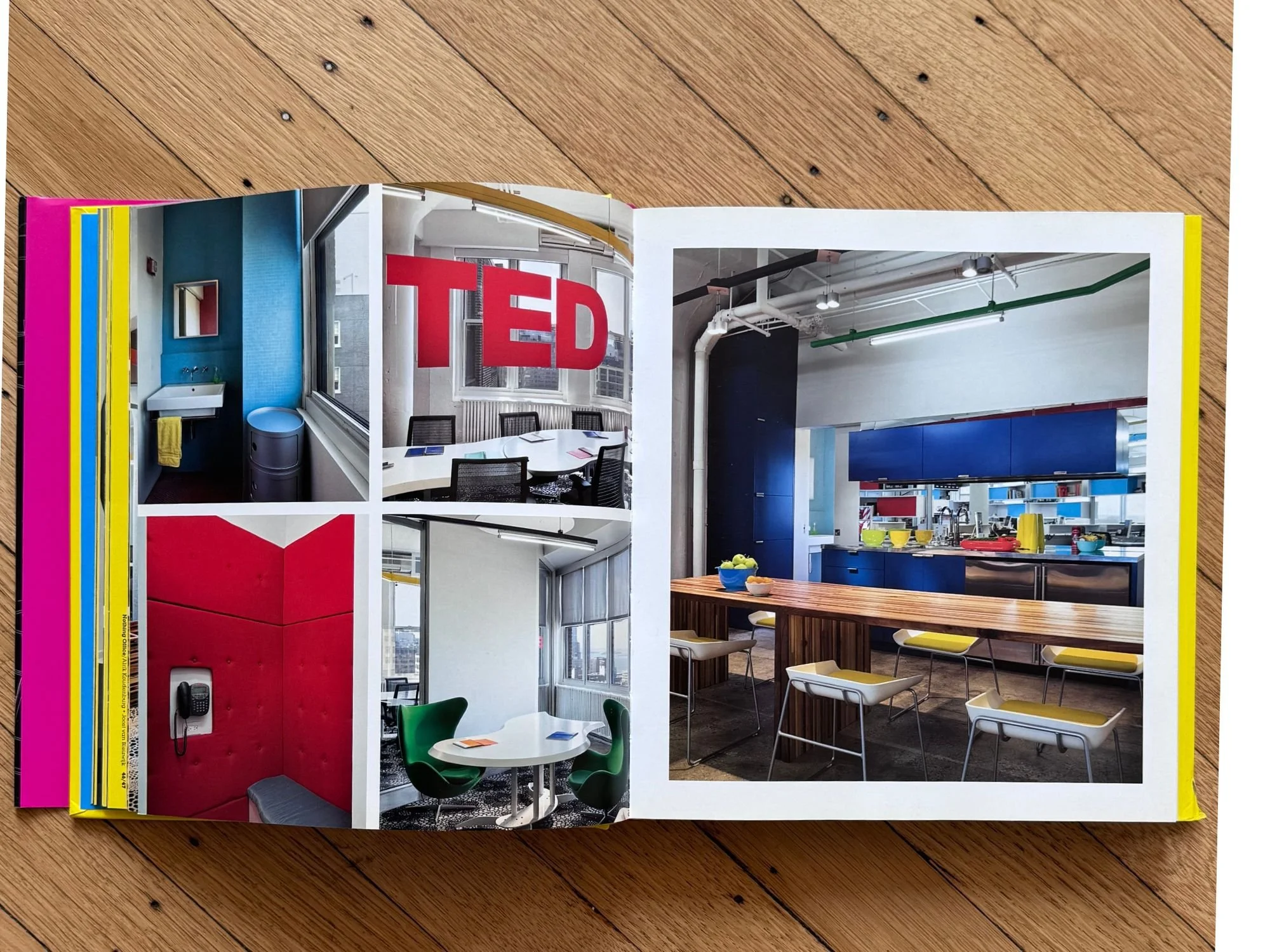 TED Conferences office in New York by Tina Manis Associates, showing color-coded ceiling-mounted service channels above an open lounge area