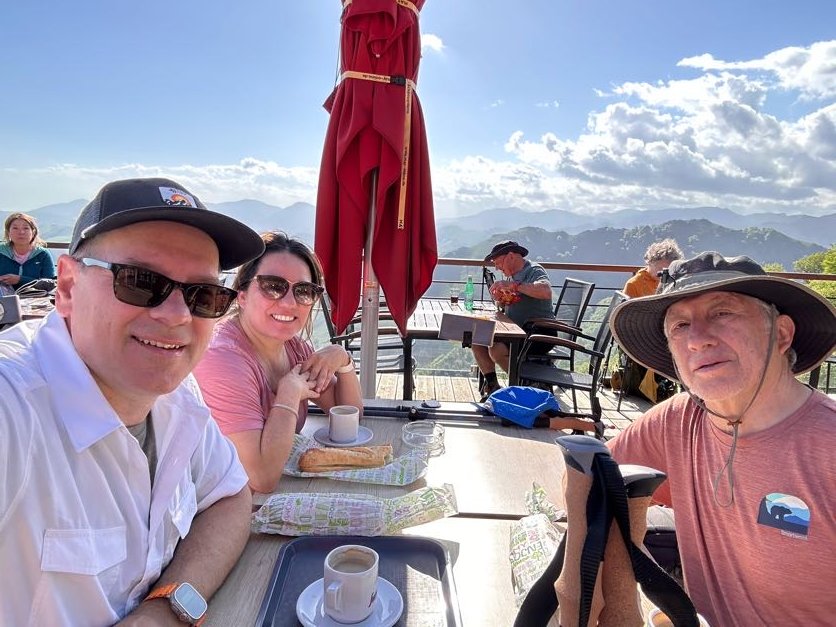Three people having lunch at Refuge d'Orison.jpg