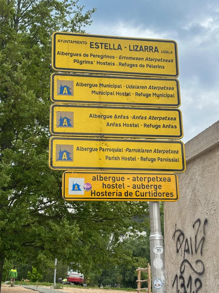 Albergue signs entering towns