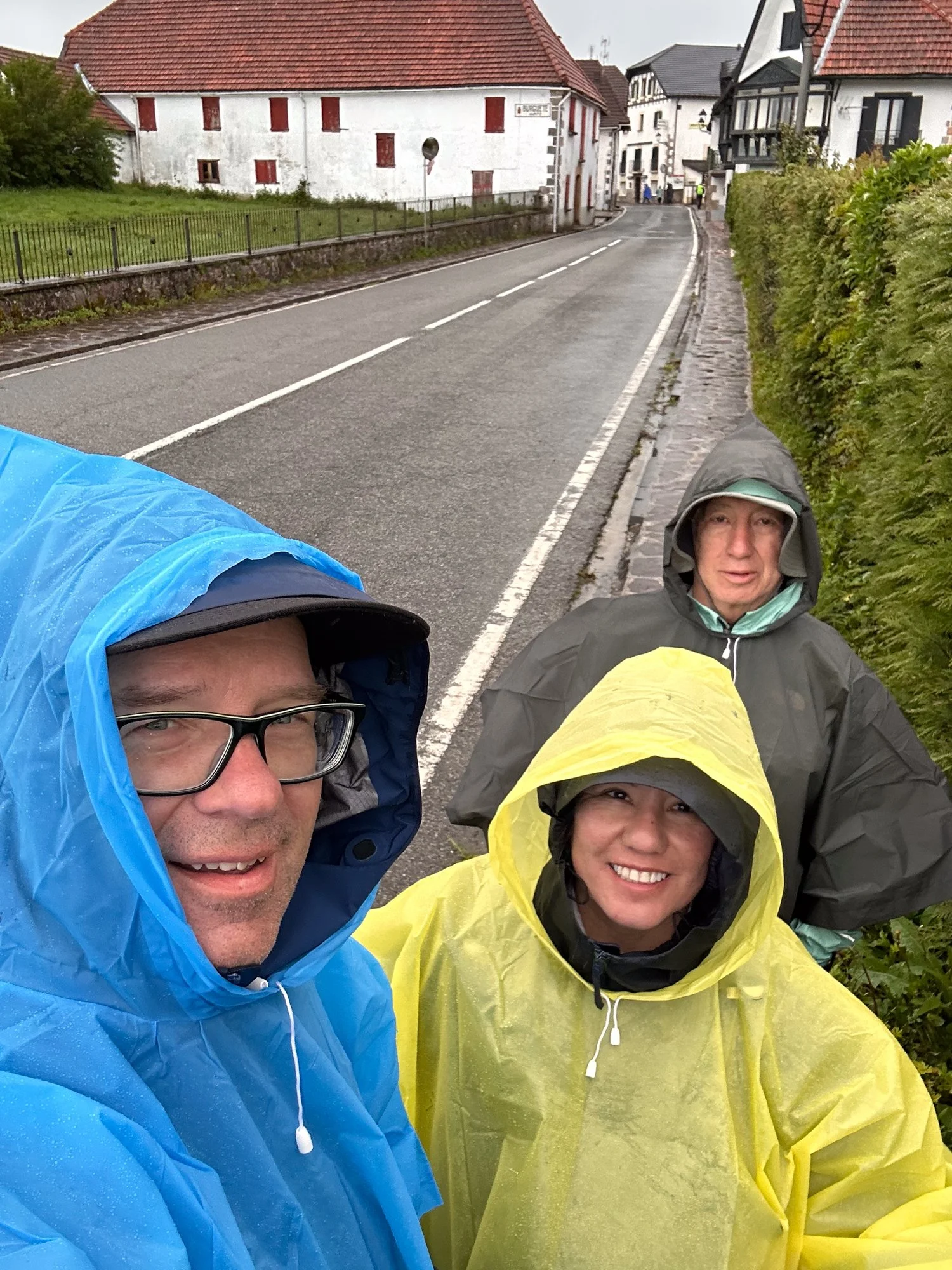 three people wearing ponchos.jpg