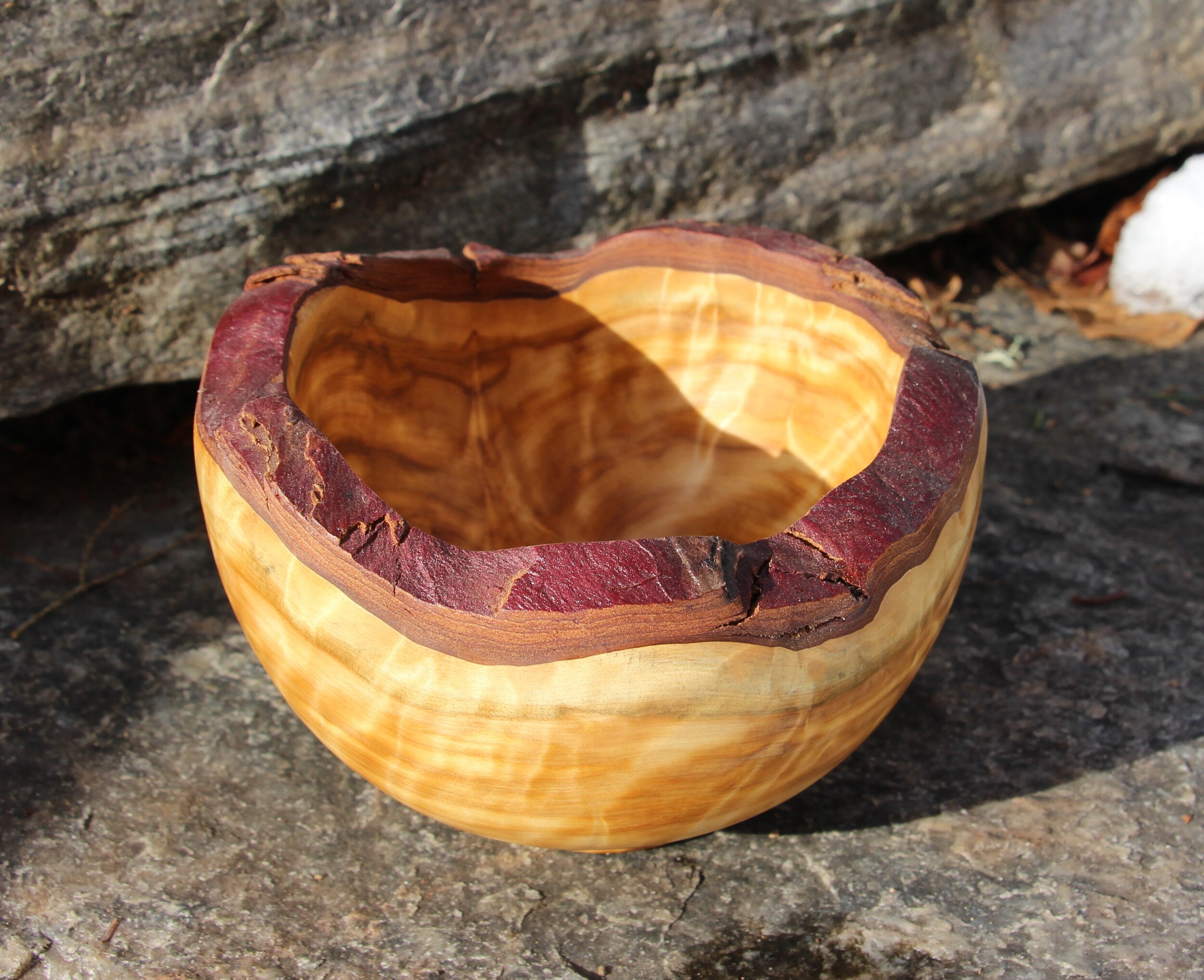  A cedar burl bowl with interesting variations of colour and figuring.  