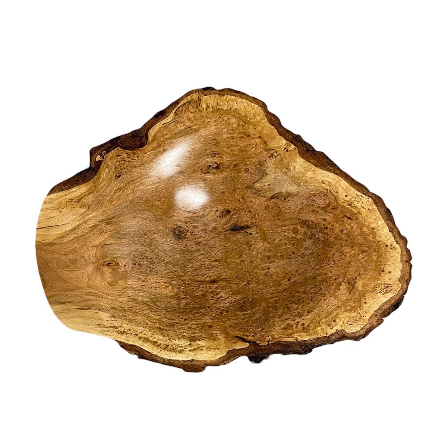 Black Cherry Burl has rich variations of colour and unique figuring. This live edge bowl has many layers of food safe oil for a durable, polished finish. 

Black Cherry Burl Bowl 12&nbsp;x 2.25 high

#woodturner #woodworking #cherrybowl #liveedgebowl