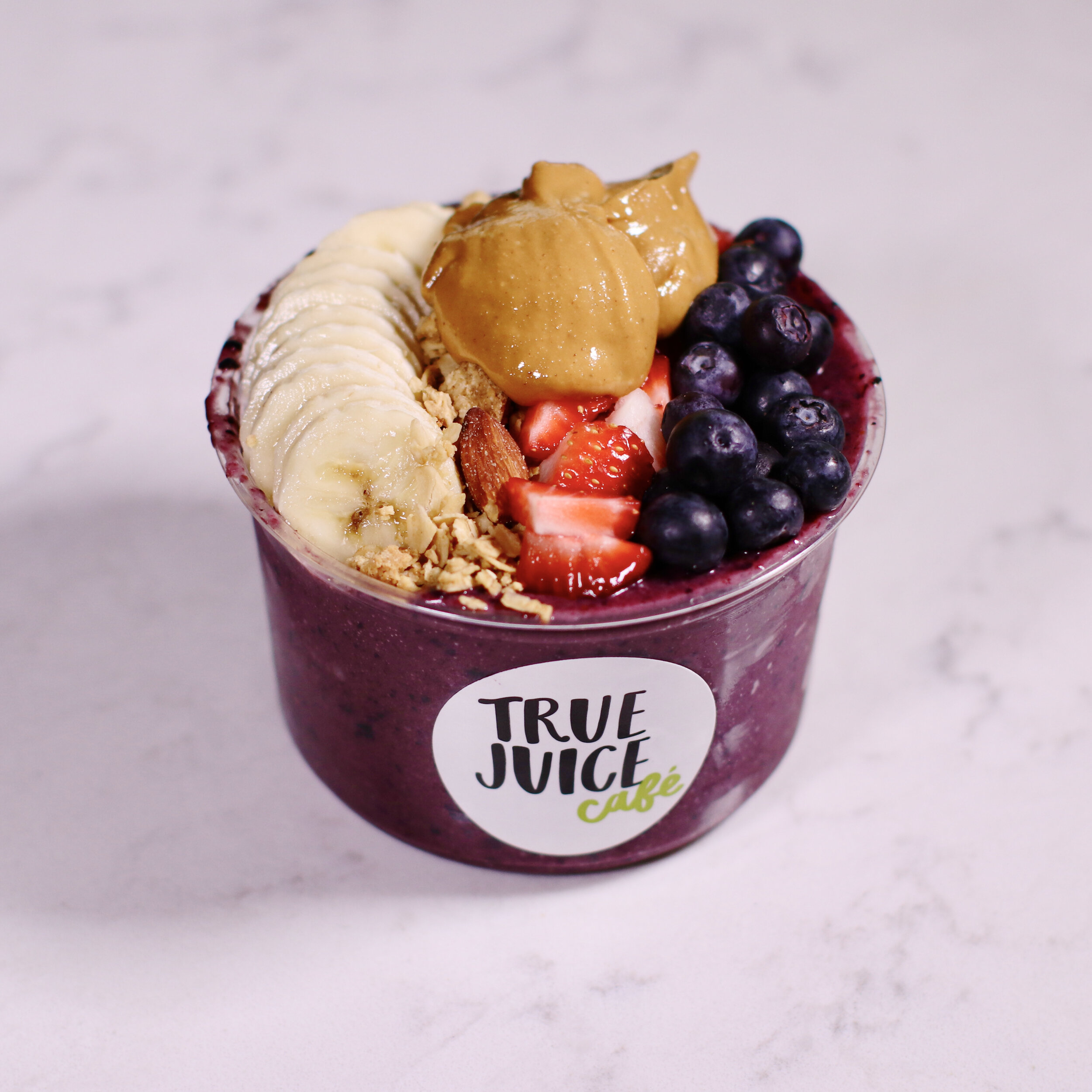 Acai Bowl - The Elvis with Vanilla & Almond Granola. Topped with Strawberry, Banana, Blueberry, and Peanut Butter.