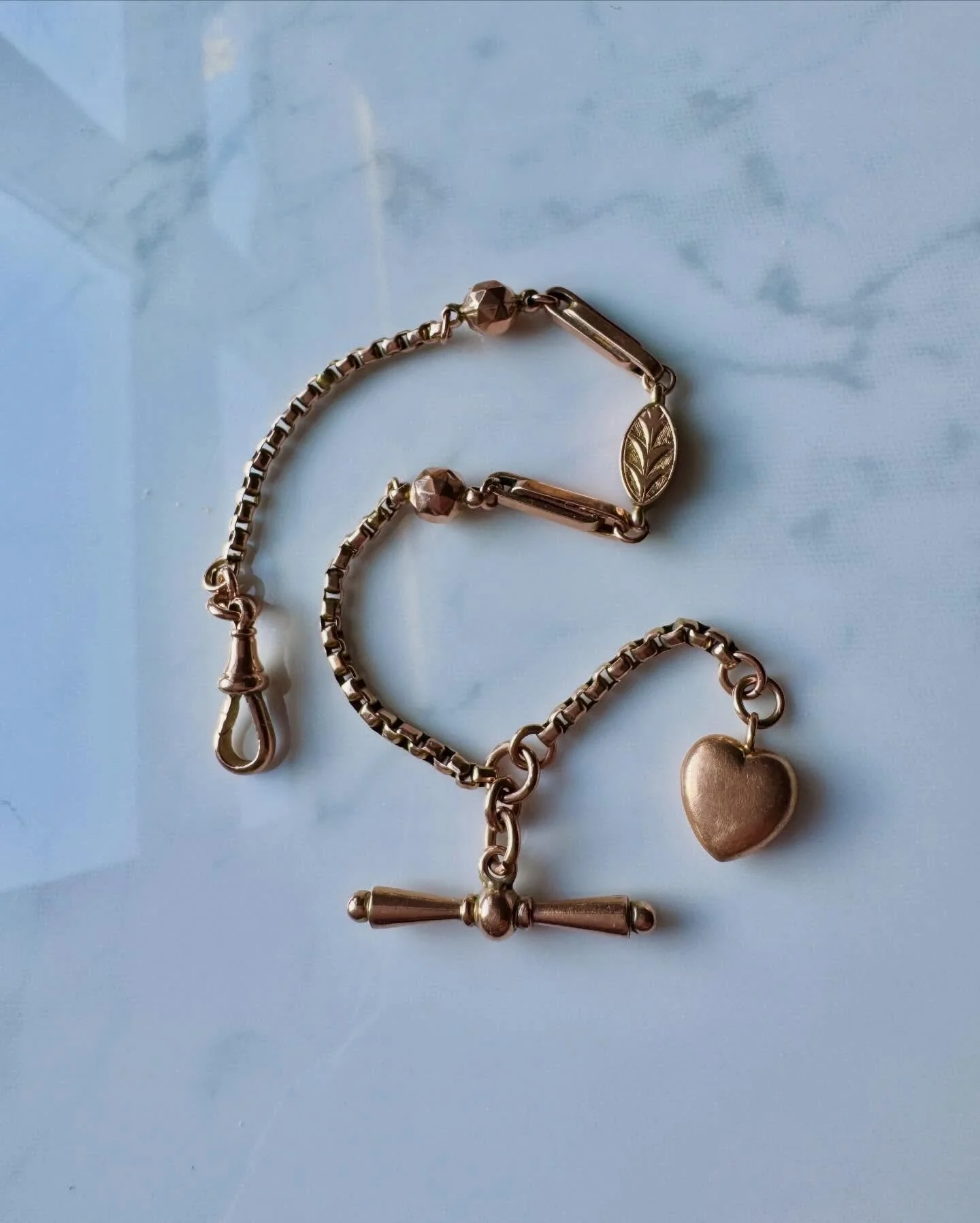 {Sold} 
N E W!
A delicate heart Albertina bracelet with fabulous mixed links, crafted in 9ct gold. This beauty has a heart, a fancy T bar, paperclip links and gold balls! So lovely and easy to wear. A piece of history as this would once have been wor
