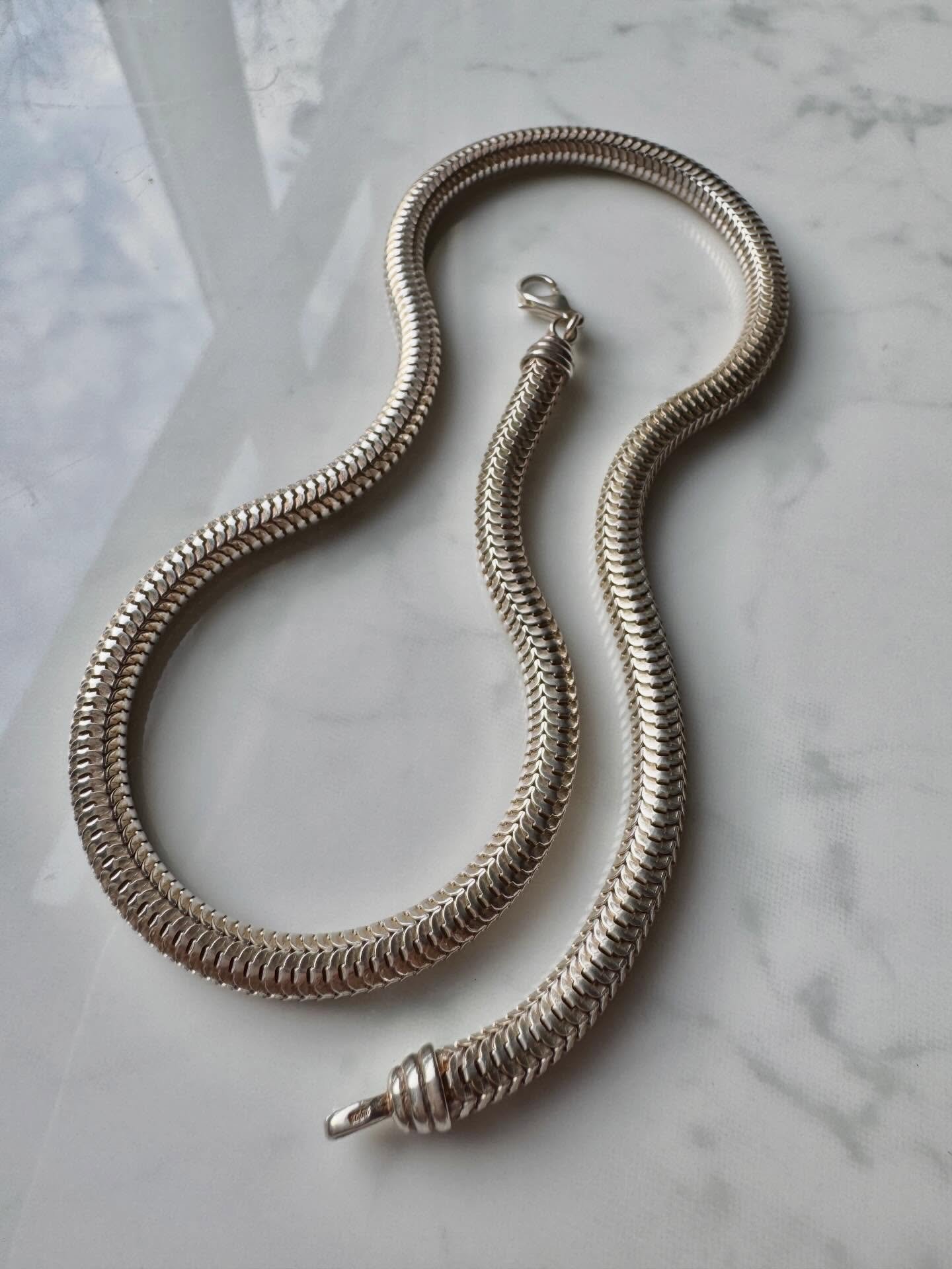 Silver snakey perfection has just landed on the website. A fabulous statement necklace - wear it alone or layered with other pieces 💫 I&rsquo;ll link it in Stories 💛
Happy hump day! 

#joaniesjewels 
#antqiuesilver
#silversnake