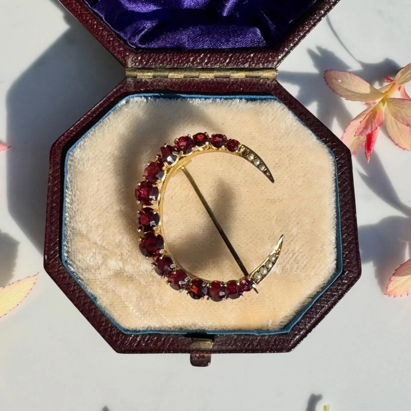 Happy International Women&rsquo;s Day! Today we have a lovely, sparkly garnet crescent with pearl accents 🌙
Details on the website. I&rsquo;ll link it in Stories. Happy Sunday my friends 💛

#joaniesjewels
#celestialsunday
#garnetcrescent