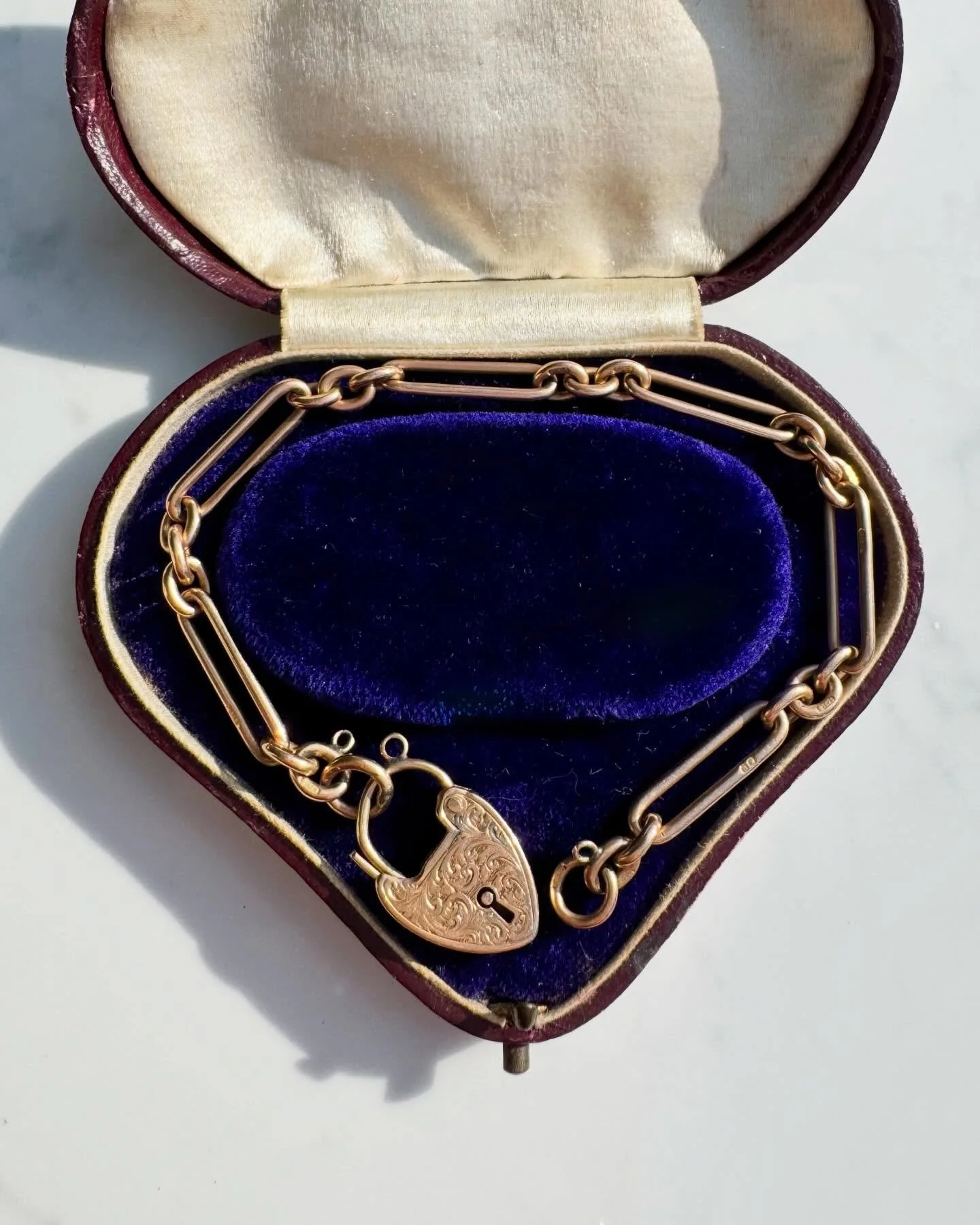 One for you if you love high carat, antique jewellery! 💫 
A highly sought after trombone link bracelet in 15ct gold with a chased heart padlock clasp. This beauty is hallmarked for 1907, made by Charles Daniel Broughton in St Paul&rsquo;s Square, Bi