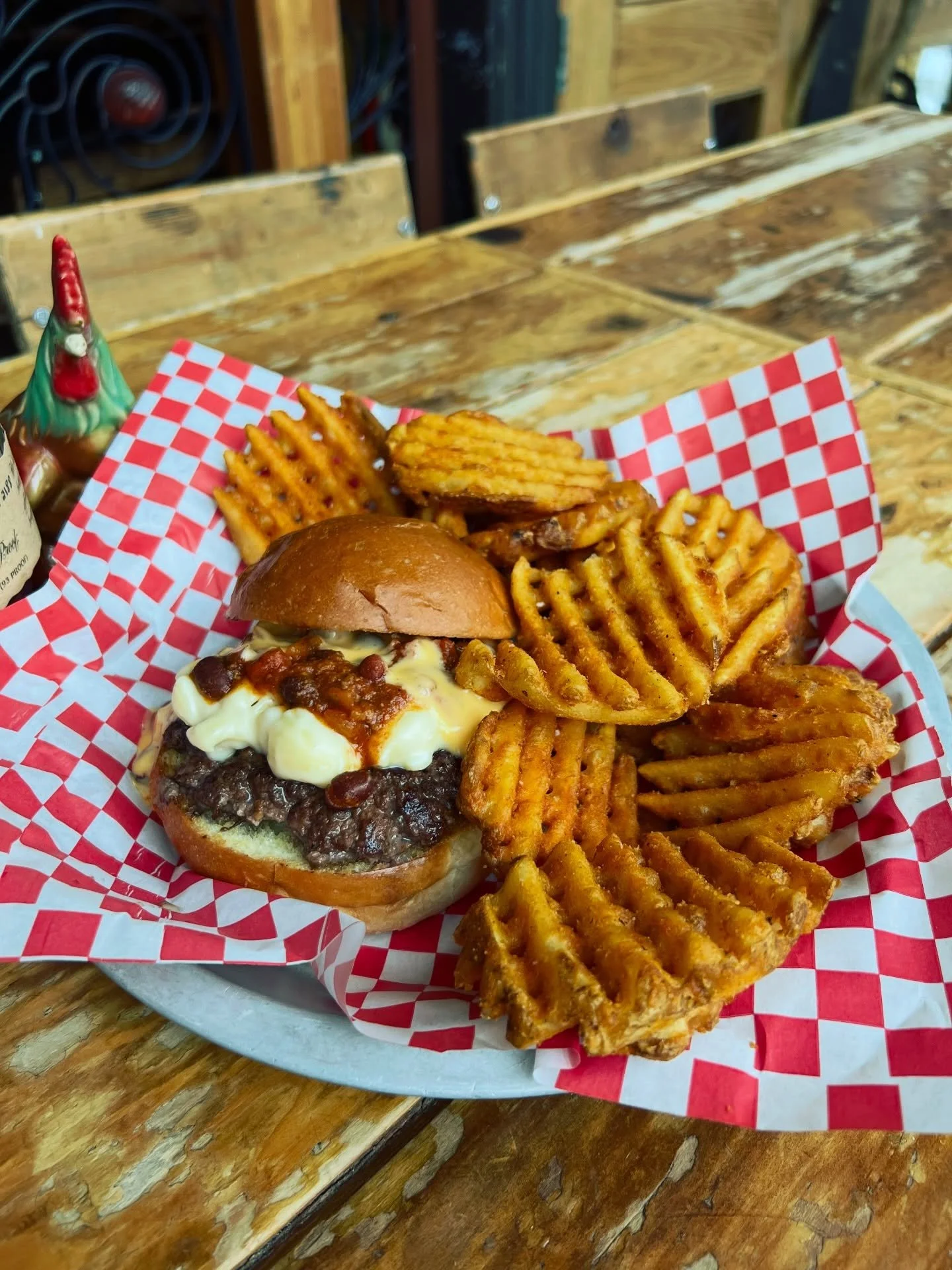 Our Burger for Burger &amp; a Bottle tonight: Chili Mac! Our Mac &amp; Cheese and house made chili on top of our burger, then MORE beer cheese, on a brioche bun. Napkins required. Only available on Whiskey Wednesday this month at the Shack!