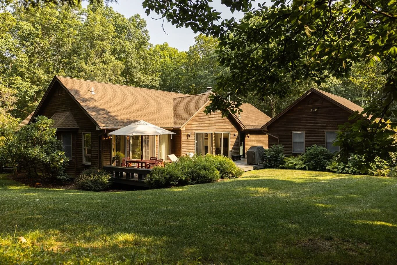 Two neighboring retreats, one rare opportunity. 
Set on a quiet dead-end road in Clinton Corners, 5 Willow Brook Ridge and 21 Pine Knoll Lane are being offered separately, yet connected by a private woodland path, creating the possibility of a one-o